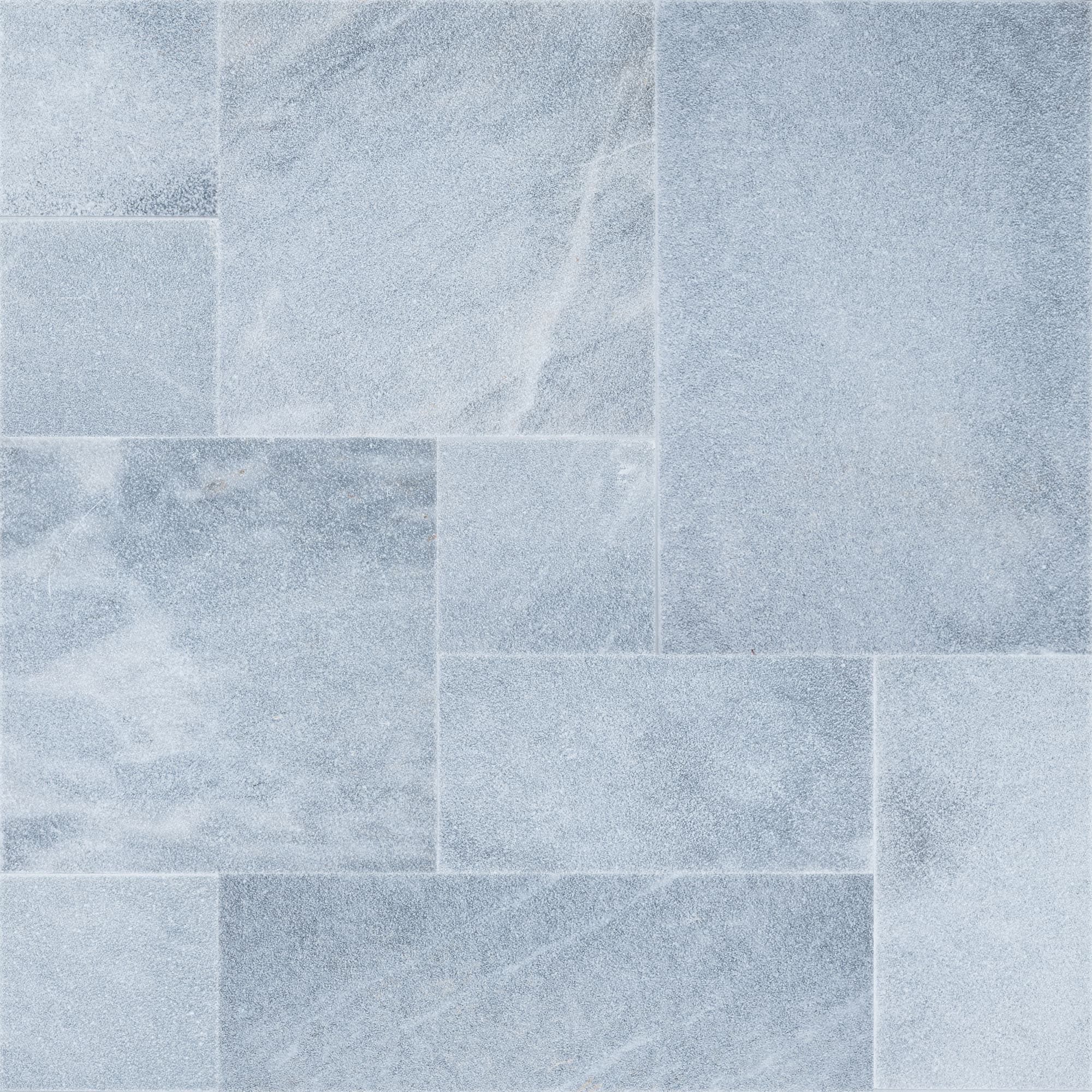 Close-up of Arctic Grey Marble Sand Blasted French Pattern 3cm Paver by STONELUX. The marble paver features a subtle grey hue with a sandblasted finish, showcasing fine texture and natural veining, ideal for elegant hardscape designs.