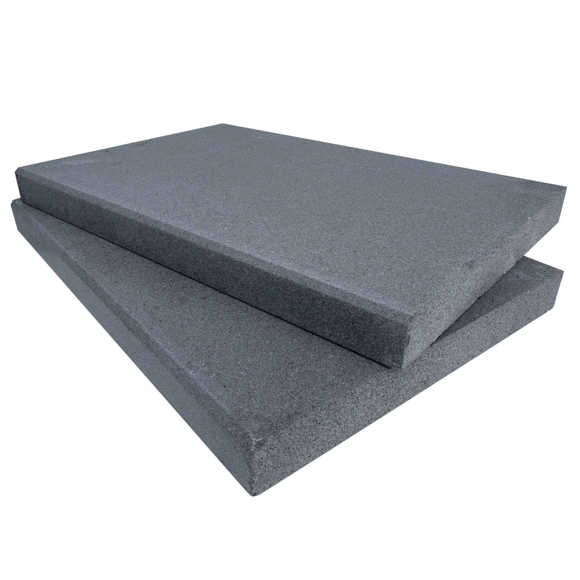 Close-up of Black Basalt Tumbled+Brushed 16x24x2 Eased Edge Coping. The basalt features a smooth, dark gray texture with subtle veining, showcasing a tumbled and brushed finish. Ideal for pool coping and hardscape applications, offering a sleek, modern...