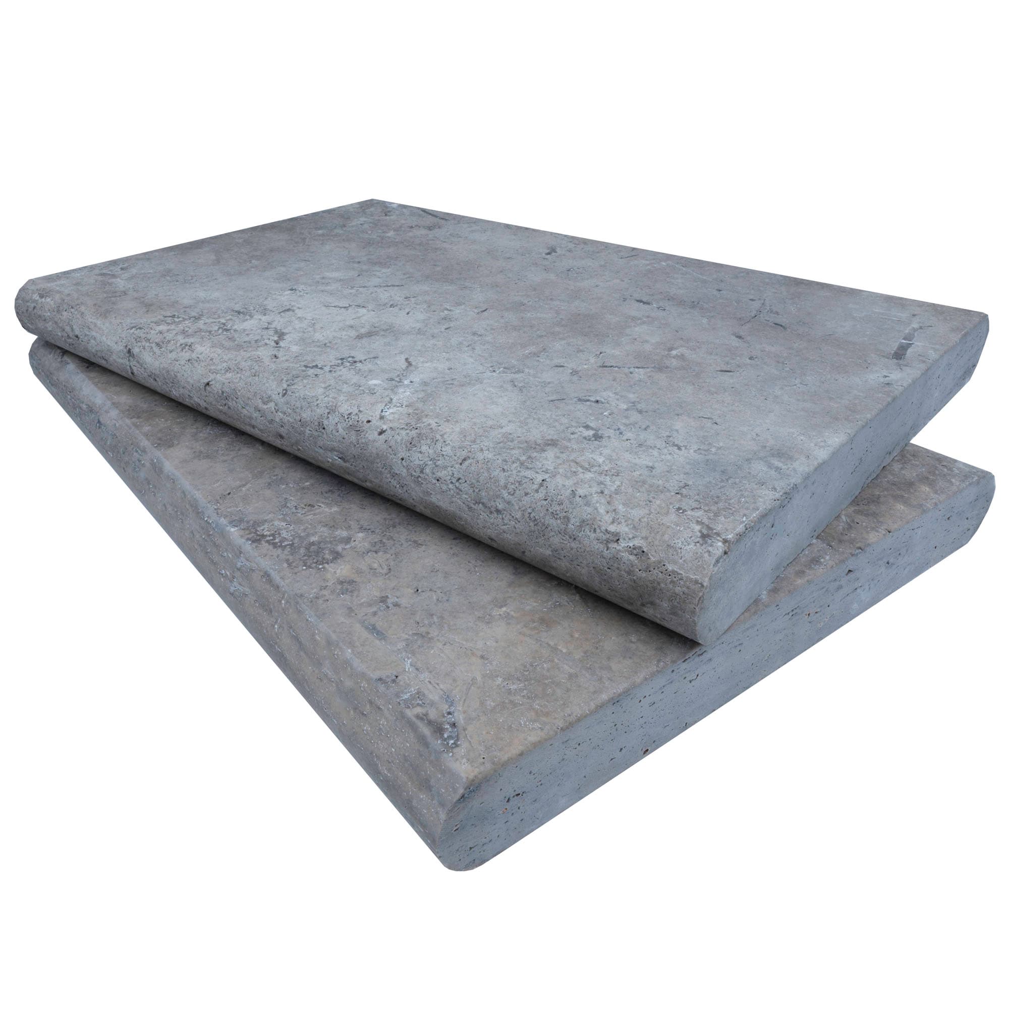 Close-up of Silver Travertine Tumbled 16x24x2 Double Bullnose Coping. The natural stone displays a smooth, weathered texture with subtle gray and beige veining, ideal for pool edging and outdoor hardscape projects, from STONELUX's premium collection.