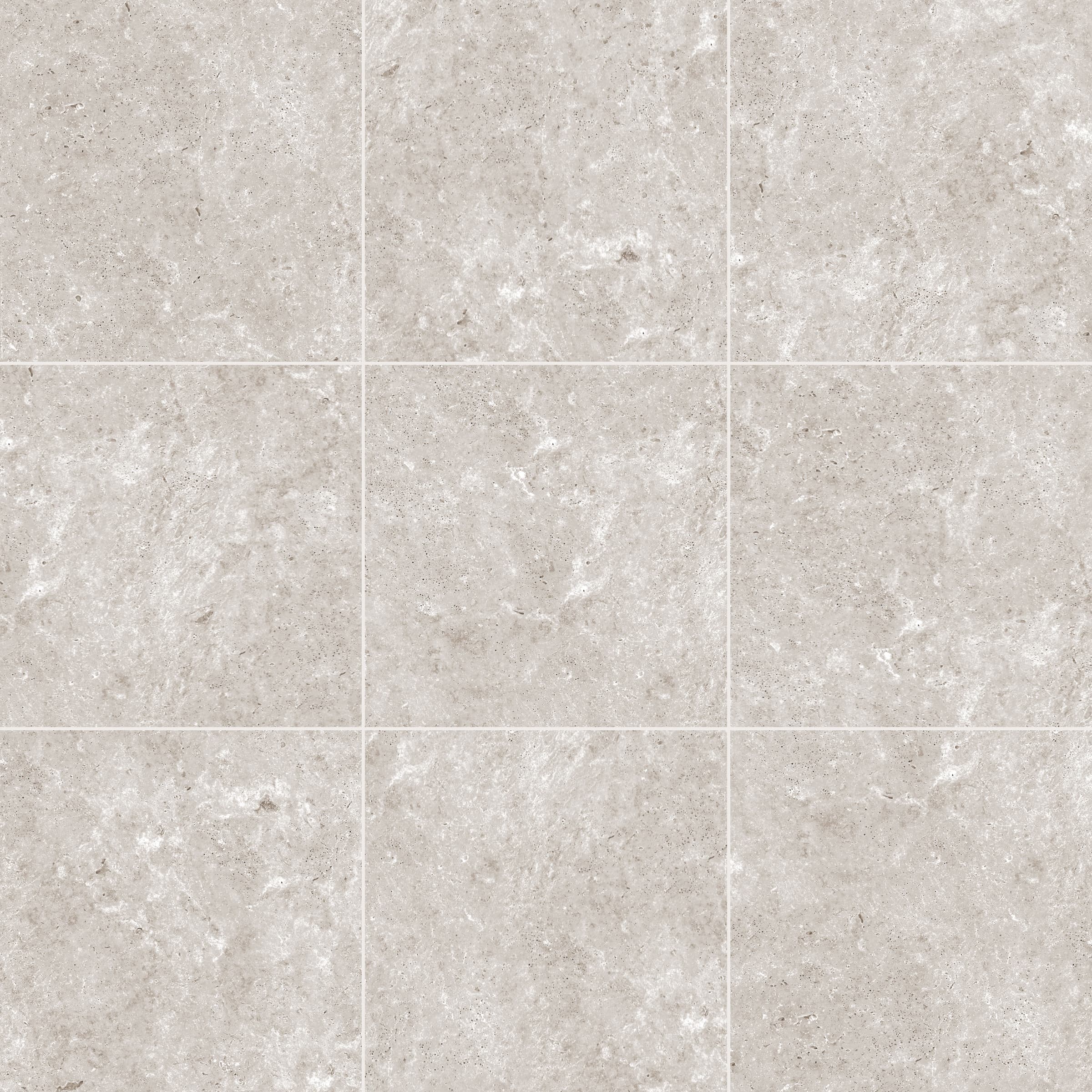 Close-up of Travertine Silver Matte 24x24x2cm Rectified Porcelain Paver from the Porcelain Pavers collection. The surface features a soft, matte finish with natural stone-like veining and a subtle silver-grey hue, ideal for patios and pool decks.