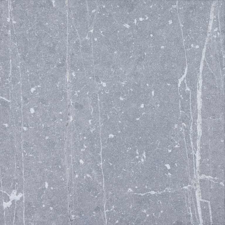 Close-up view of Aegean Grey Marble from STONELUX, showcasing its natural stone texture with subtle grey tones and white veining. Ideal for hardscape projects, this marble offers a sophisticated, timeless look for patios and pool areas.
