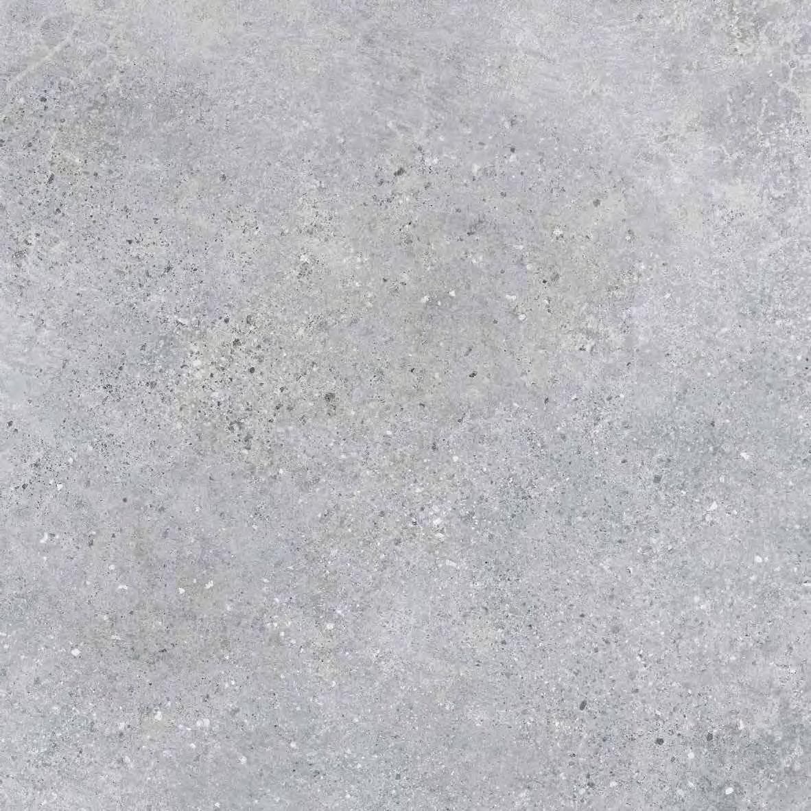 Close-up image of the Grava Gray Matte 24x24x2cm Rectified Porcelain Paver from Stonelux. Showcasing a fine, speckled texture with subtle gray veining, the matte finish enhances its natural stone appearance, ideal for modern hardscape projects and patios.