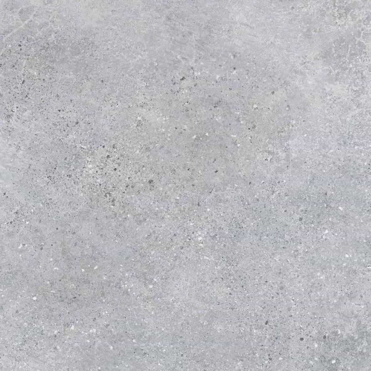 Close-up image of the Grava Gray Matte 24x24x2cm Rectified Porcelain Paver from Stonelux. Showcasing a fine, speckled texture with subtle gray veining, the matte finish enhances its natural stone appearance, ideal for modern hardscape projects and patios.