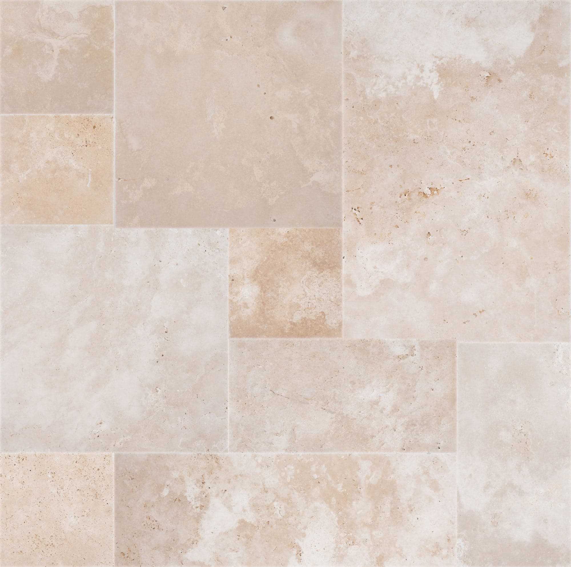 Ivory Travertine Tumbled French Pattern 3cm Paver by STONELUX features a blend of soft beige and cream tones with a natural tumbled texture. Ideal for patios and pool decks, this premium travertine paver showcases a classic, elegant look perfect for ou...
