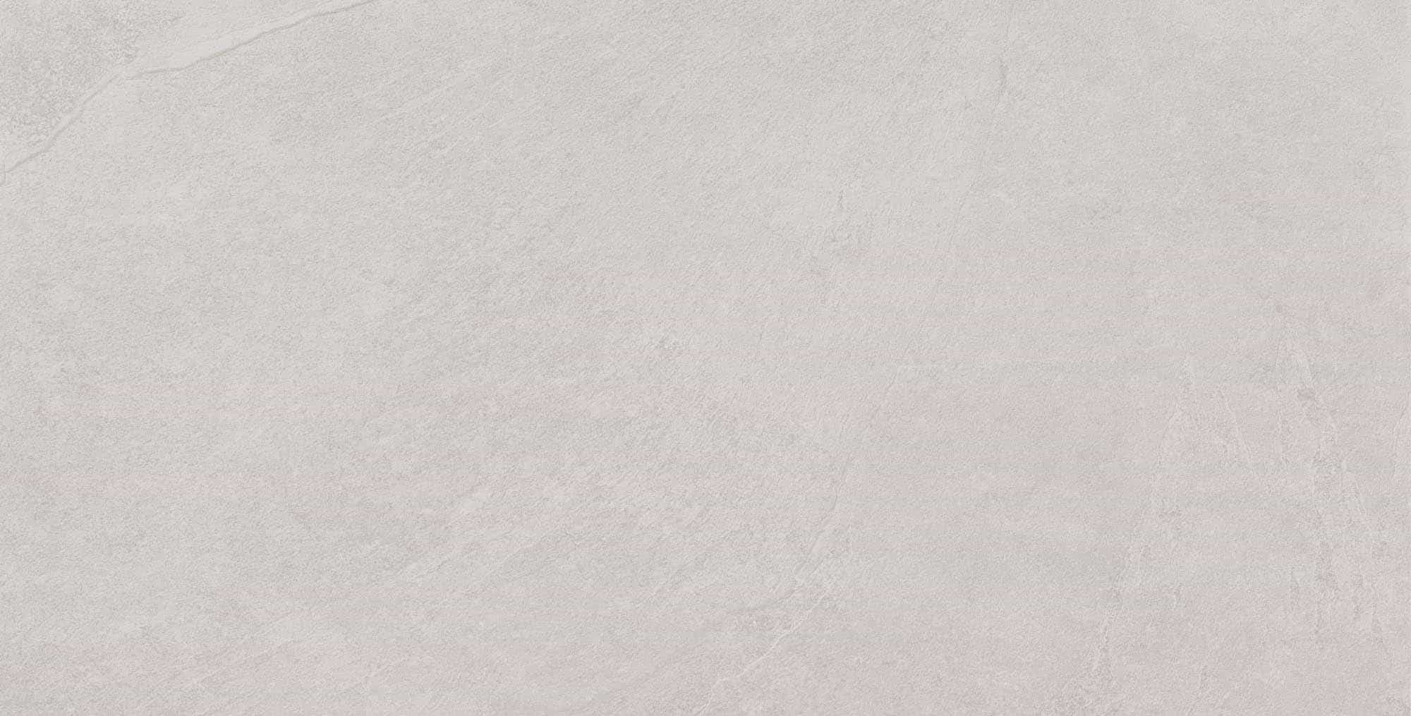 Close-up of the Overland Pearl Matte 24x48x2cm Rectified Porcelain Paver, showcasing its smooth matte finish and subtle, natural stone-like texture. The light cream color adds an elegant, timeless appeal, ideal for modern hardscape and poolside projects.
