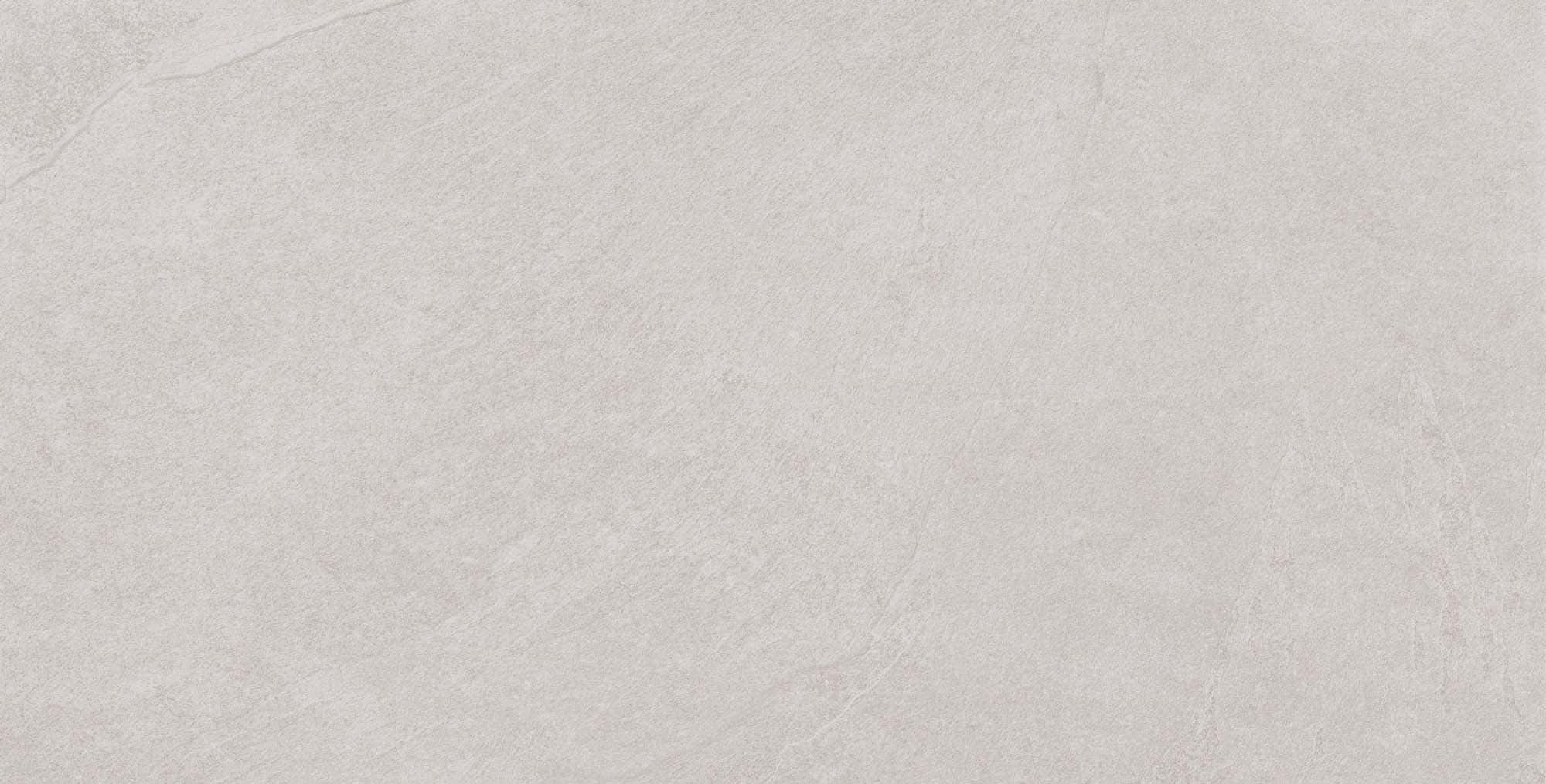 Close-up of the Overland Pearl Matte 24x48x2cm Rectified Porcelain Paver, showcasing its smooth matte finish and subtle, natural stone-like texture. The light cream color adds an elegant, timeless appeal, ideal for modern hardscape and poolside projects.