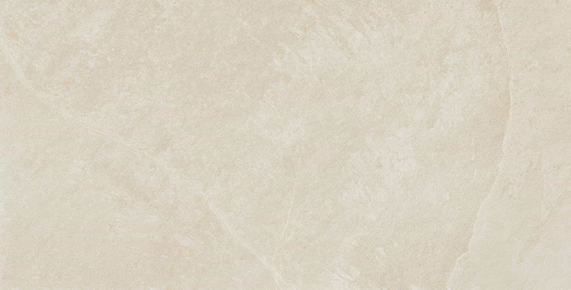 Close-up of the Overland Sand Matte 24x48x2cm Rectified Porcelain Paver from the Porcelain Pavers collection by STONELUX. The paver showcases a soft beige hue with subtle veining and a smooth matte finish, ideal for modern hardscape projects.