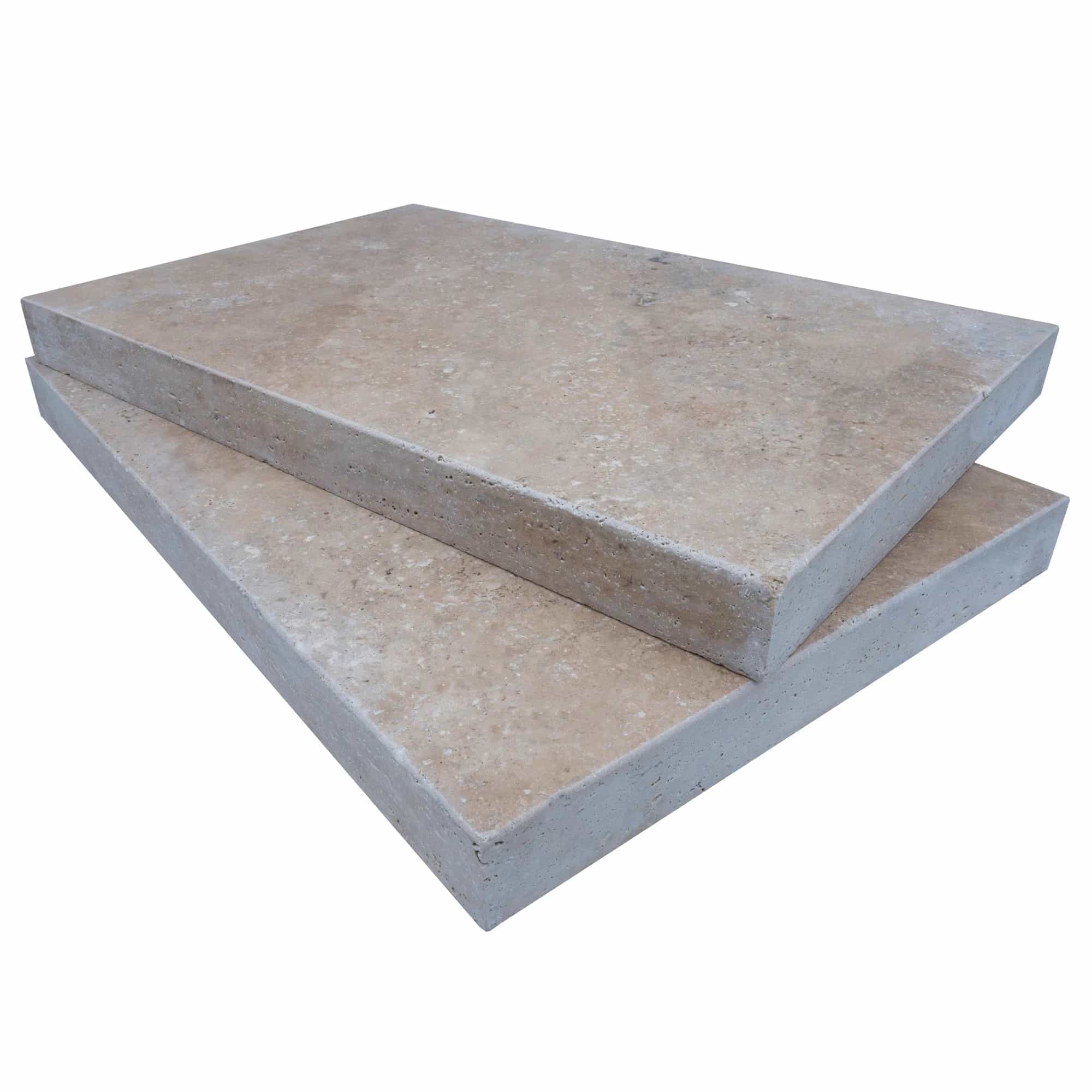 Close-up of Philly Travertine Tumbled 16x24x2 Eased Edge Coping, showcasing its natural stone texture and warm beige tones. The tumbled finish highlights subtle veining, ideal for premium pool coping or patio projects. Perfect for hardscape enhancements.