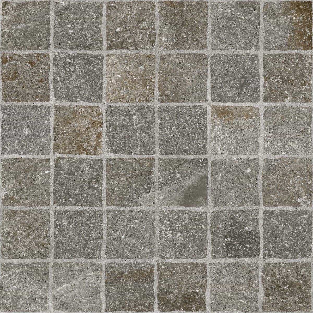 Close-up of Porfido Gray Matte 24x24x2cm Rectified Porcelain Paver from the Porcelain Pavers collection. Features a textured matte surface with natural stone appearance, showcasing varied gray tones and subtle veining, ideal for hardscape projects.
