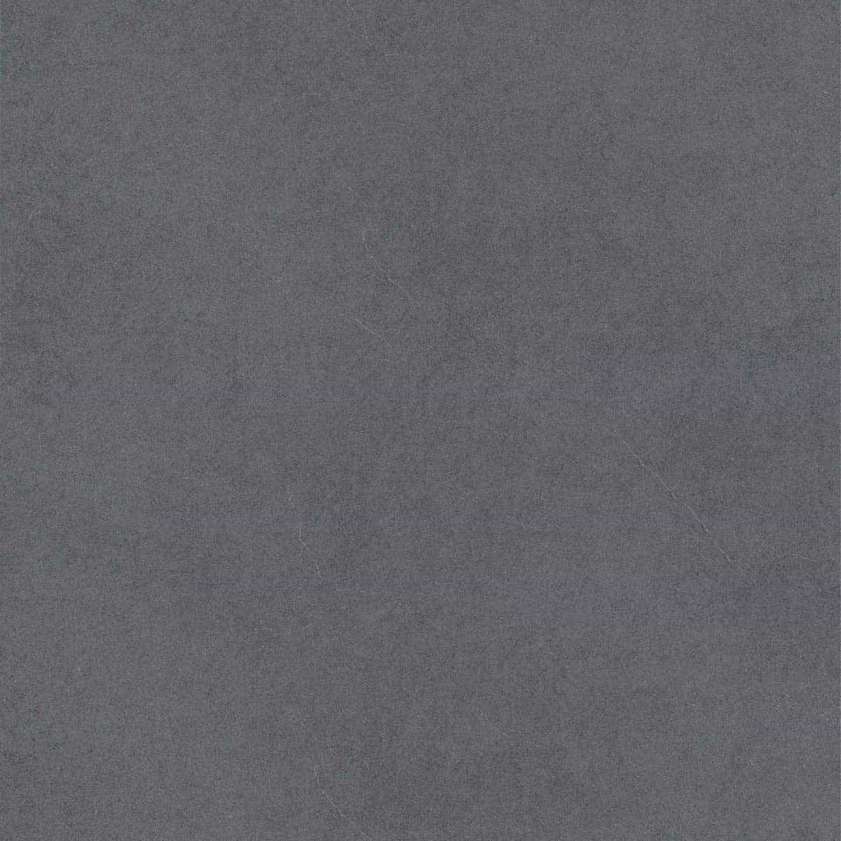 Close-up of Silver Beach Matte 24x24x2cm Rectified Porcelain Paver by STONELUX. The paver features a smooth matte finish with subtle gray tones and fine veining, ideal for modern hardscape projects. Perfect for patios, pool decks, and outdoor renovations.