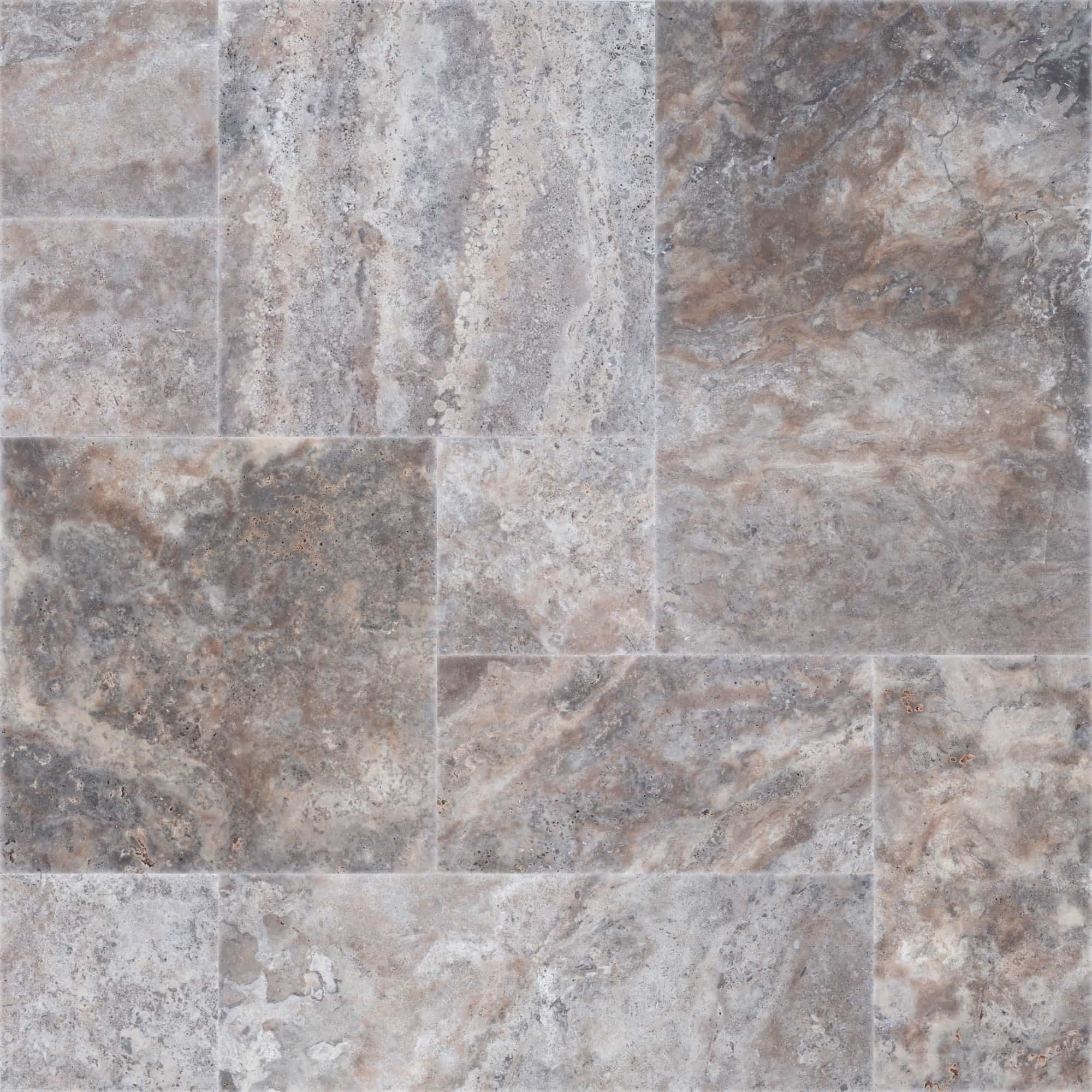 Close-up of Silver Titanium Travertine Tumbled French Pattern 3cm Paver by STONELUX. The natural stone features a blend of silver, gray, and earthy tones with a tumbled finish, showcasing its unique veining and textured surface, ideal for premium hards...