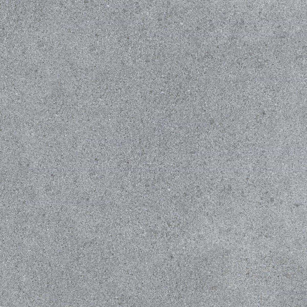 Close-up view of the Sira Gray Matte 24x24x2cm Rectified Porcelain Paver from Stonelux. The matte finish features a smooth, uniform gray surface with subtle texture, ideal for modern hardscape projects like patios and pool decks. Perfect for sleek outd...