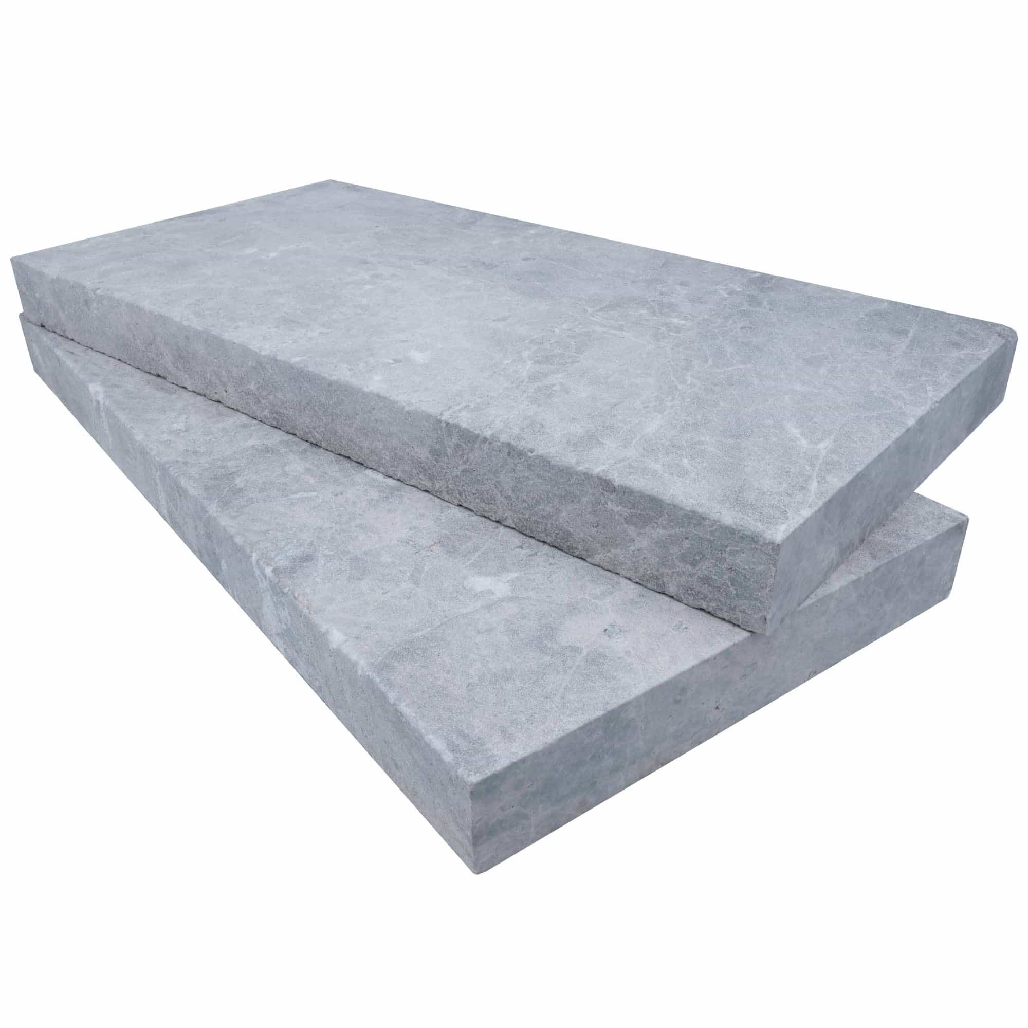 Close-up of Tundra Grey Marble Sand Blasted 12x24x2 Eased Edge Coping by STONELUX. The natural stone features a smooth, sandblasted finish with subtle grey veining, ideal for pool coping or patio edges, showcasing its premium marble texture and durabil...