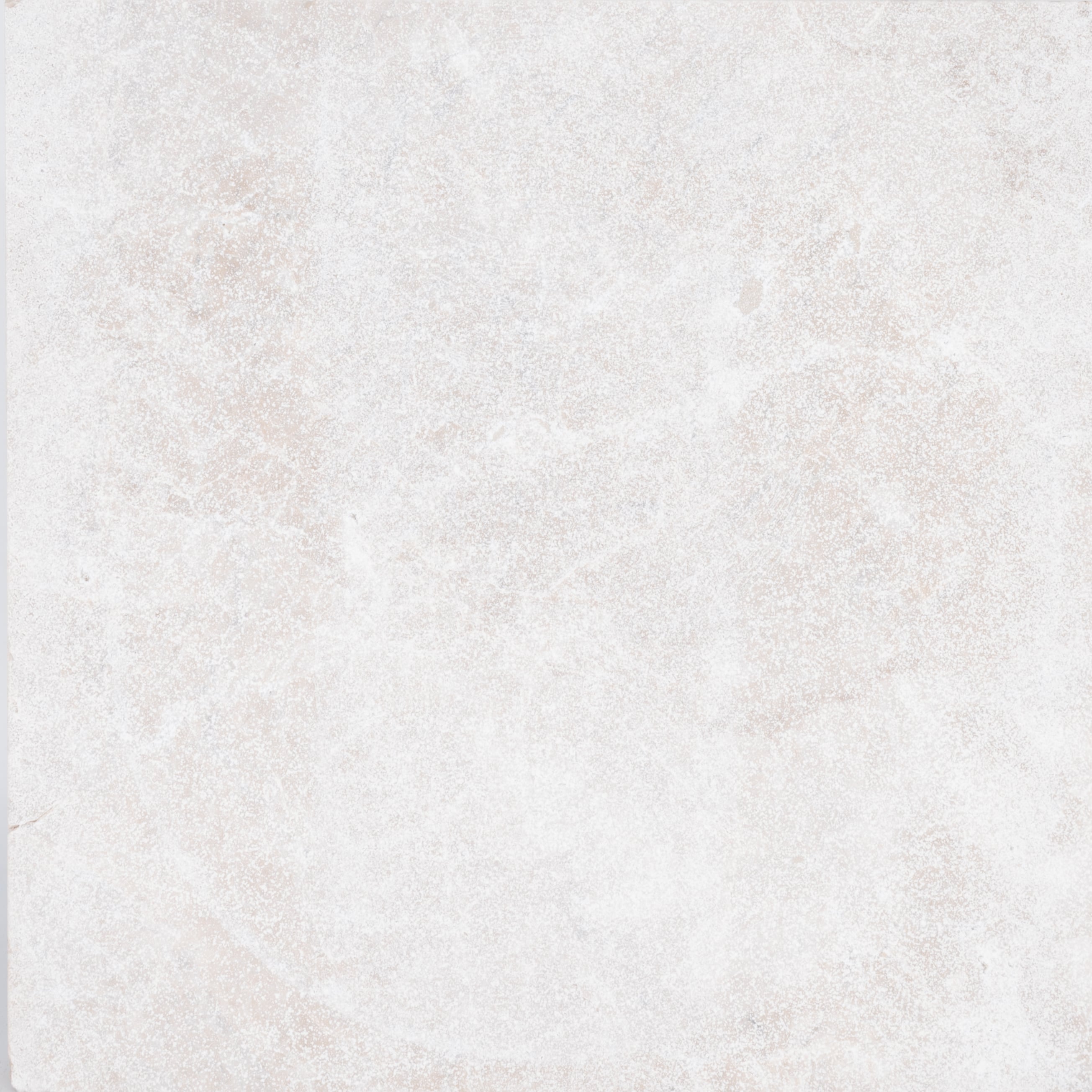 Close-up of Pera Cream Marble by STONELUX, showcasing a smooth, creamy texture with subtle veining. The natural stone exhibits a soft beige hue, ideal for premium hardscape projects and elegant pool builds. Perfect for luxury renovations and modern des...