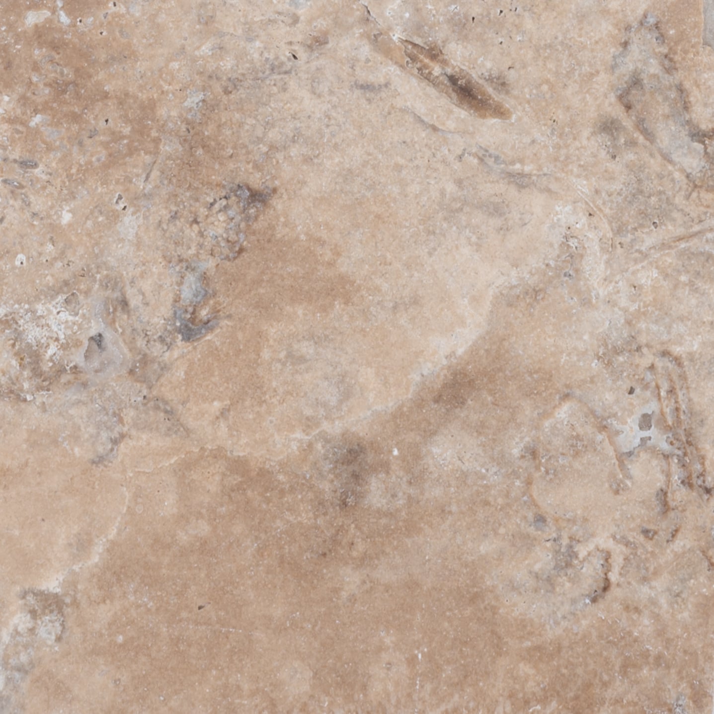 Close-up of Philly Travertine natural stone showcasing its textured surface with warm beige tones and subtle veining. Ideal for elegant pool decks, patios, and hardscape projects. Perfect for those seeking premium travertine with natural stone appeal.