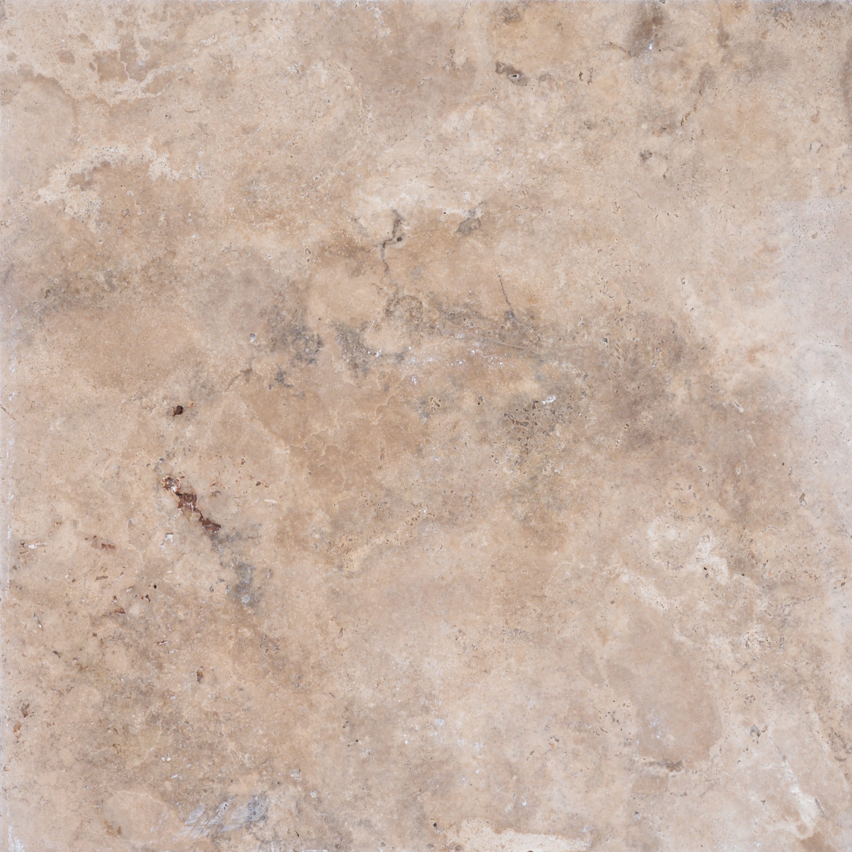Close-up of Stonelux Walnut Travertine natural stone showcasing its warm beige and tan hues with subtle veining and a textured surface, ideal for upscale hardscape projects, pool decks, and patios.