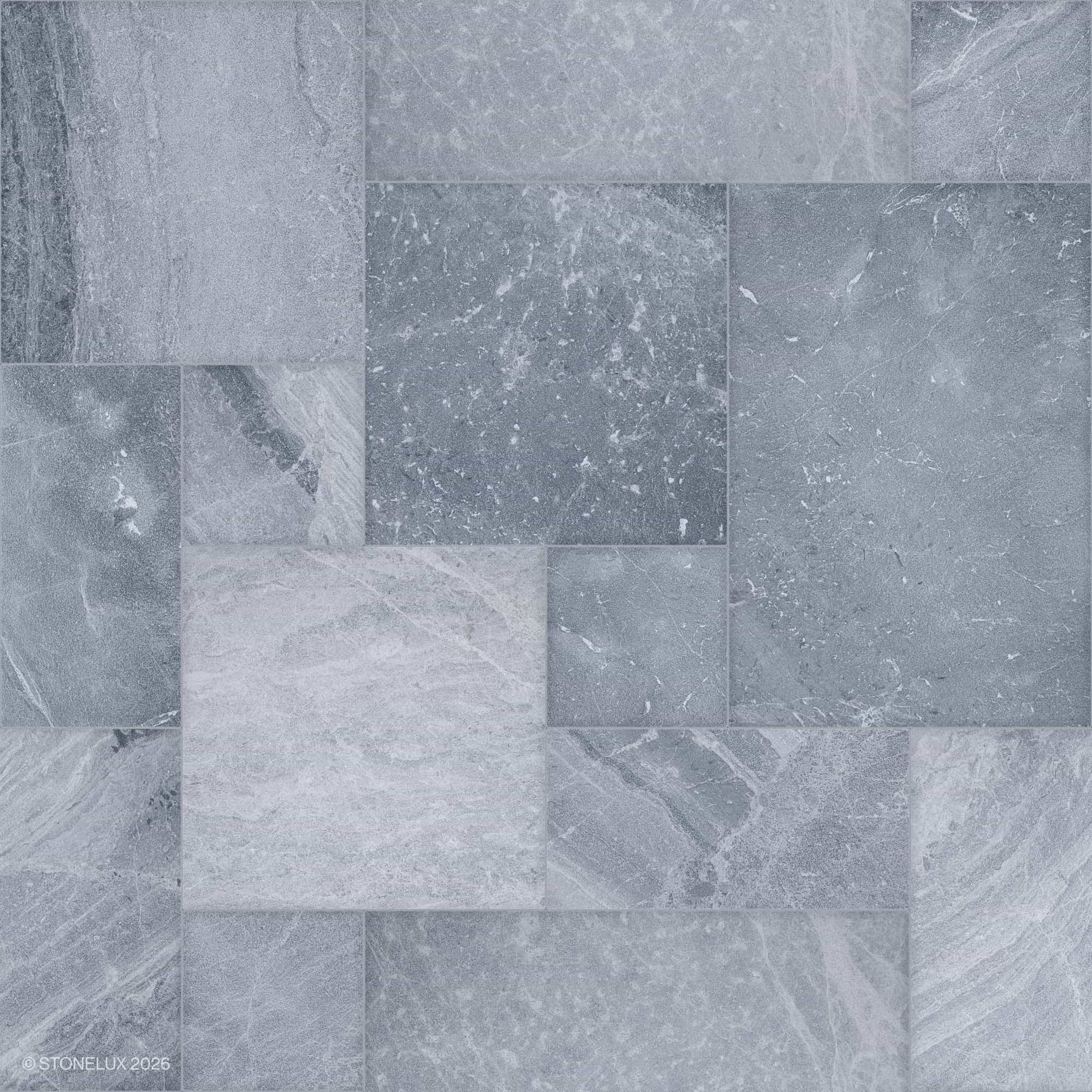 Close-up of Aegean Grey Marble Sand Blasted French Pattern 3cm Paver by STONELUX. The natural stone features a subtle grey hue with intricate veining and a textured sandblasted finish, ideal for elegant hardscape projects and pool areas.