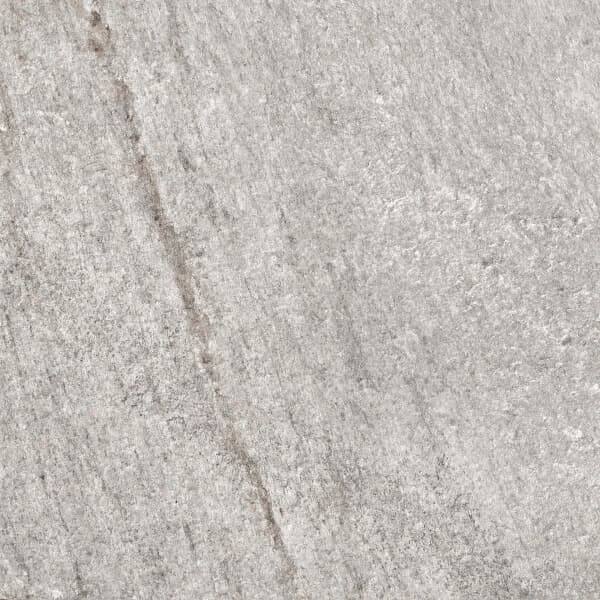 Close-up of Indiana Gris Matte 24x48x2cm Rectified Porcelain Paver by STONELUX, showcasing a subtle gray hue with natural stone-like texture. The matte finish highlights delicate veining, ideal for modern hardscape and pool projects.
