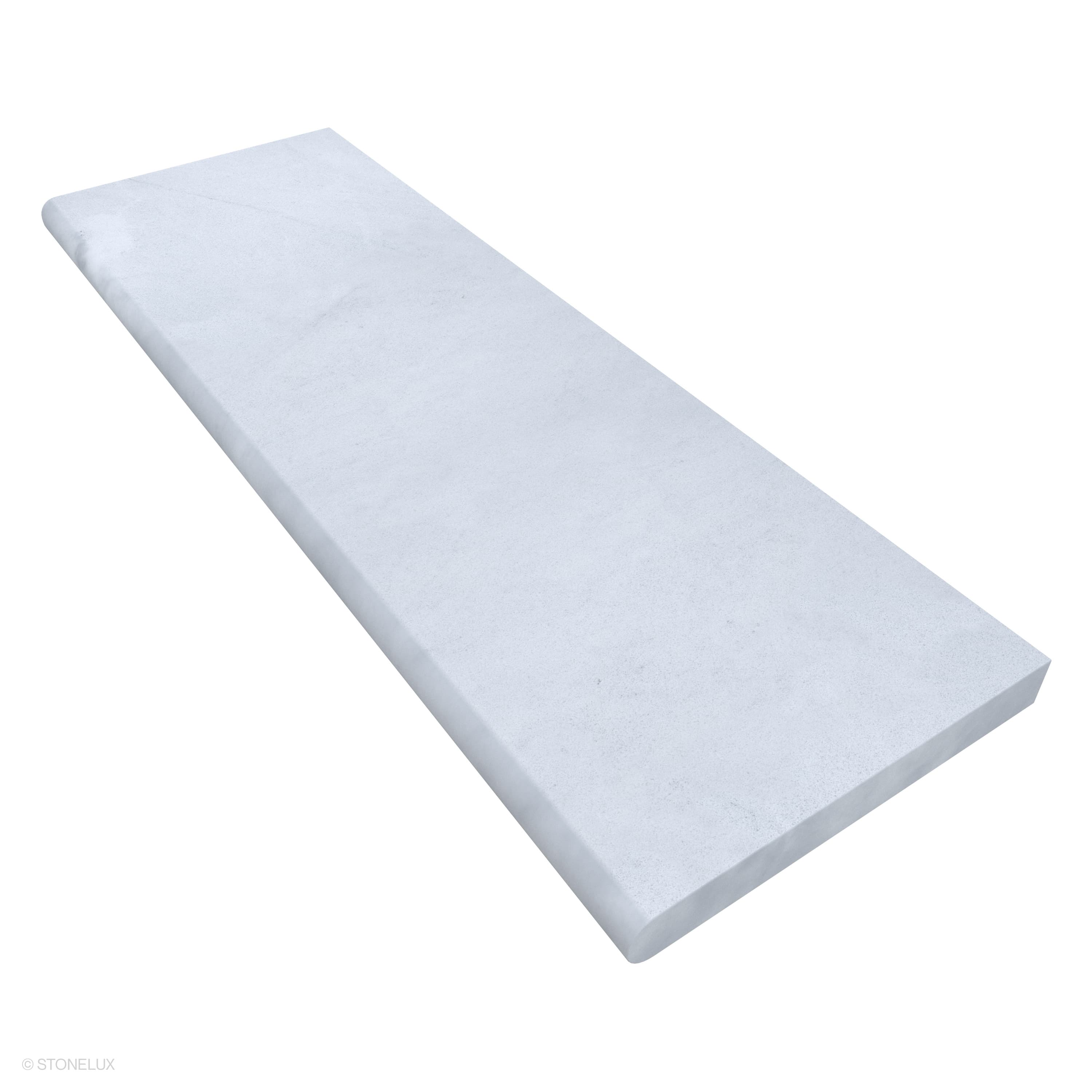 Close-up of Afyon White Marble Sand Blasted 16x48x2 Single Bullnose Coping from STONELUX. The marble features a smooth, sandblasted texture with subtle white veining, ideal for pool edges or wall caps. Its long, elegant design ensures a modern, seamles...