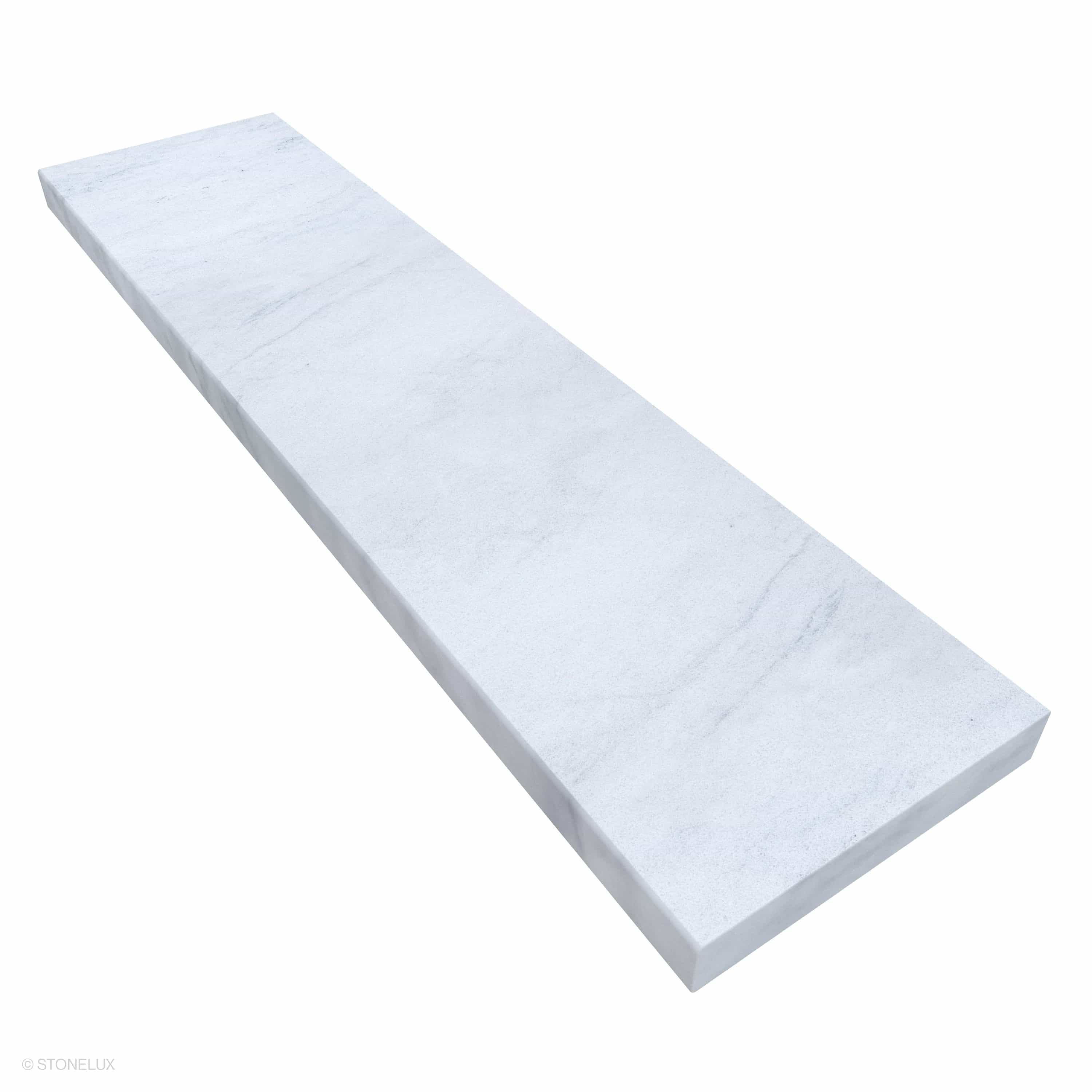 Close-up of the Stonelux Afyon White Marble Sand Blasted 12x48x2 Eased Edge Coping, showcasing its smooth, sandblasted finish and subtle white veining. The marble piece features an eased edge profile, ideal for pool coping and modern hardscape designs.