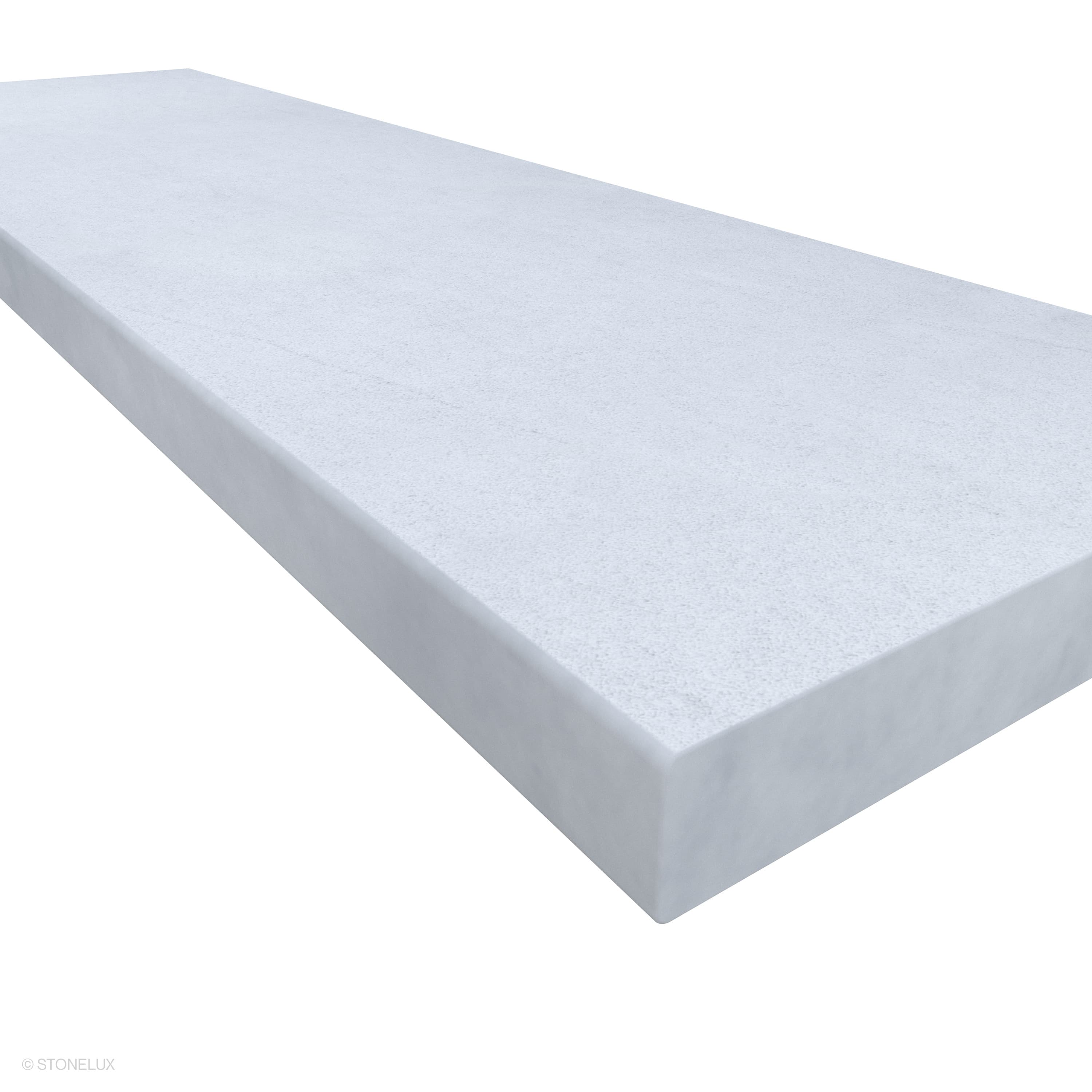 Afyon White Marble Sand Blasted 14x48x2 Eased Edge Coping by STONELUX displayed in a close-up. The marble showcases a smooth sandblasted texture with subtle veining and an elegant white hue, ideal for pool edges, wall tops, and step applications.