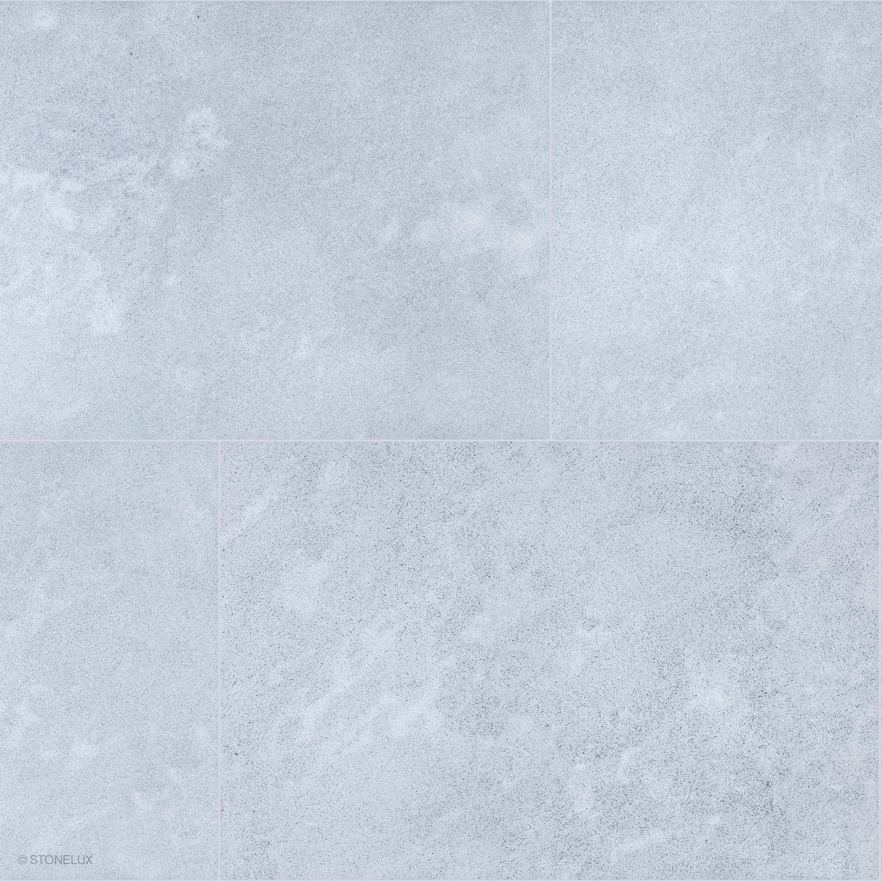 Product view of Afyon Grey Marble Sand Blasted 24x36 3cm Paver, showing a light cool-grey marble surface with fine blue-grey speckling, soft cloudy movement, and its textured finish.