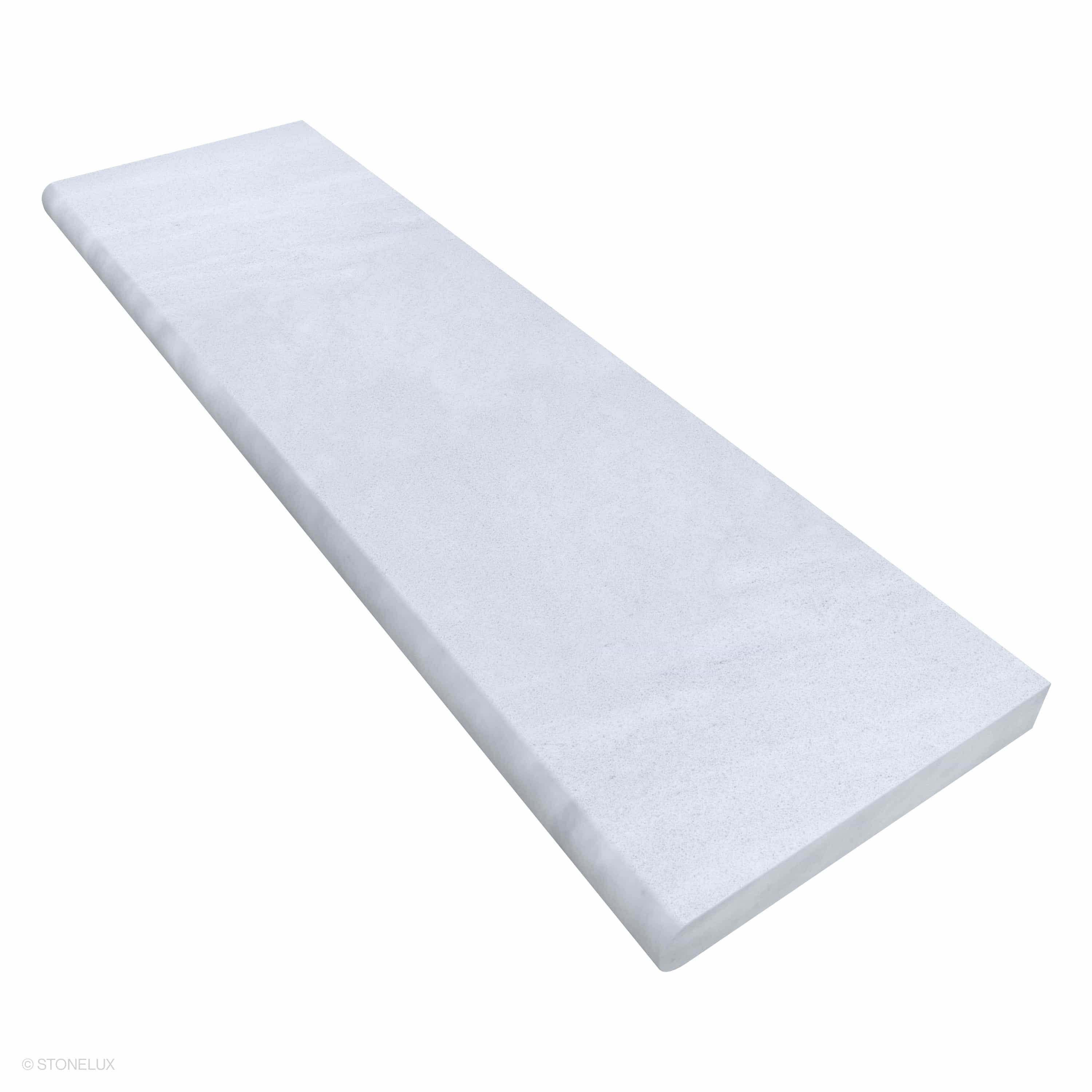 Close-up of Afyon White Marble Sand Blasted 14x48x2 Single Bullnose Coping by STONELUX. The marble exhibits a smooth sandblasted texture with subtle white veining, perfect for elegant pool edges or wall caps, enhancing luxury hardscape projects.
