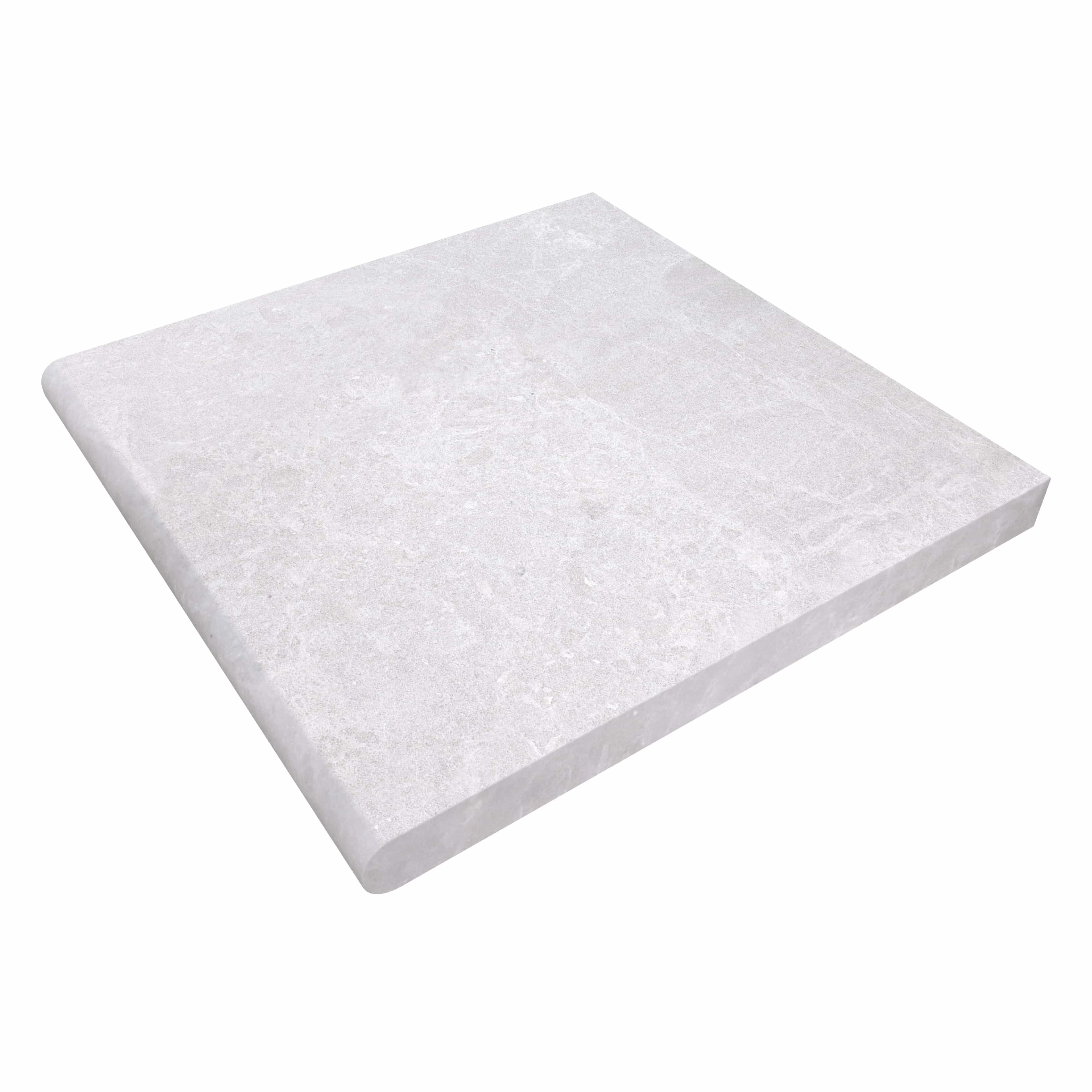 Close-up of the Pera Cream Marble Sand Blasted 24x24x2 Single Bullnose Coping by STONELUX. The marble features a soft cream color with subtle veining, sandblasted finish, and a smooth bullnose profile, ideal for pool edges and step landings.