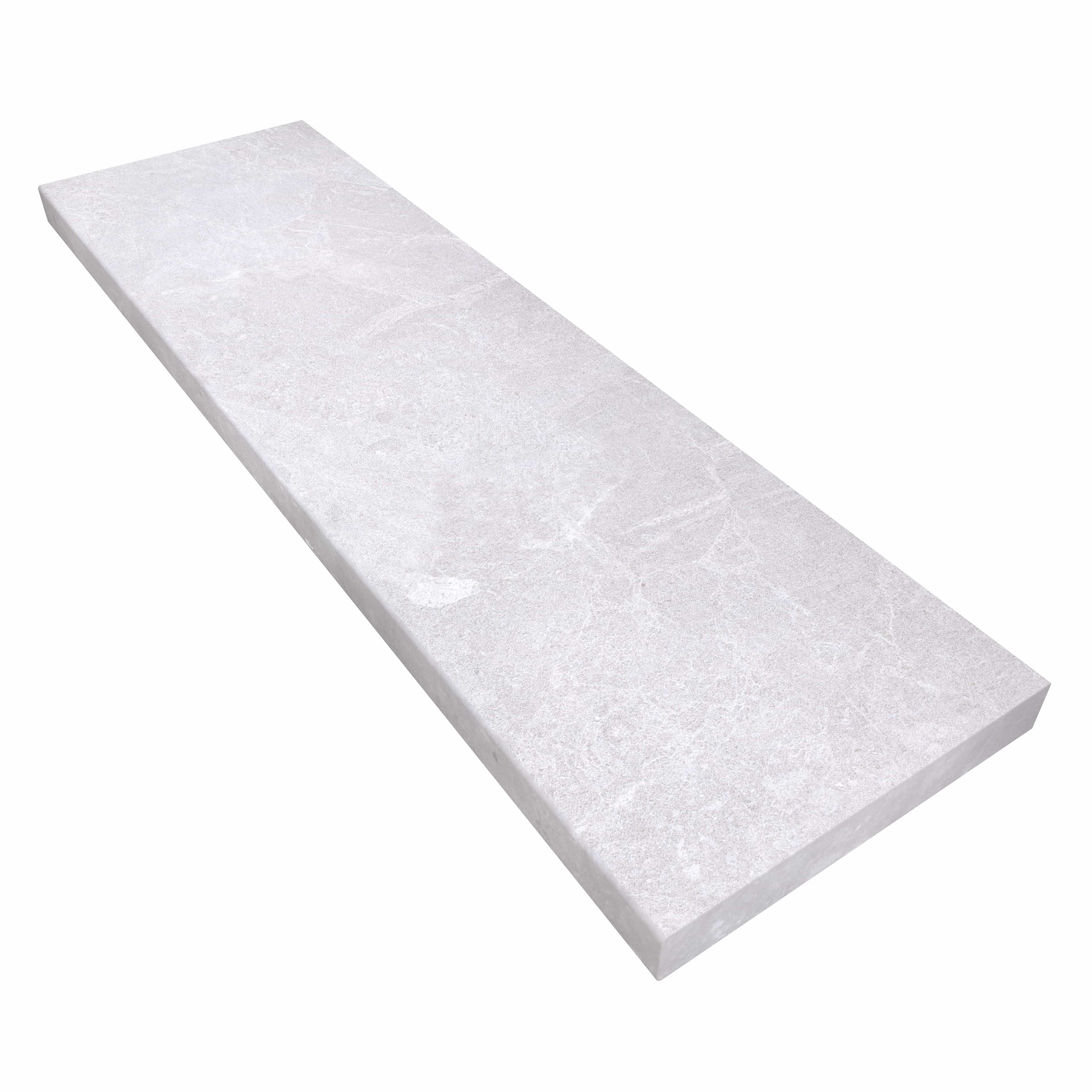 Close-up of the Pera Cream Marble Sand Blasted 14x48x2 Eased Edge Coping, showcasing its light cream color with subtle veining and a textured sandblasted finish. Ideal for pool edges and steps, this marble piece adds elegance to any hardscape project.