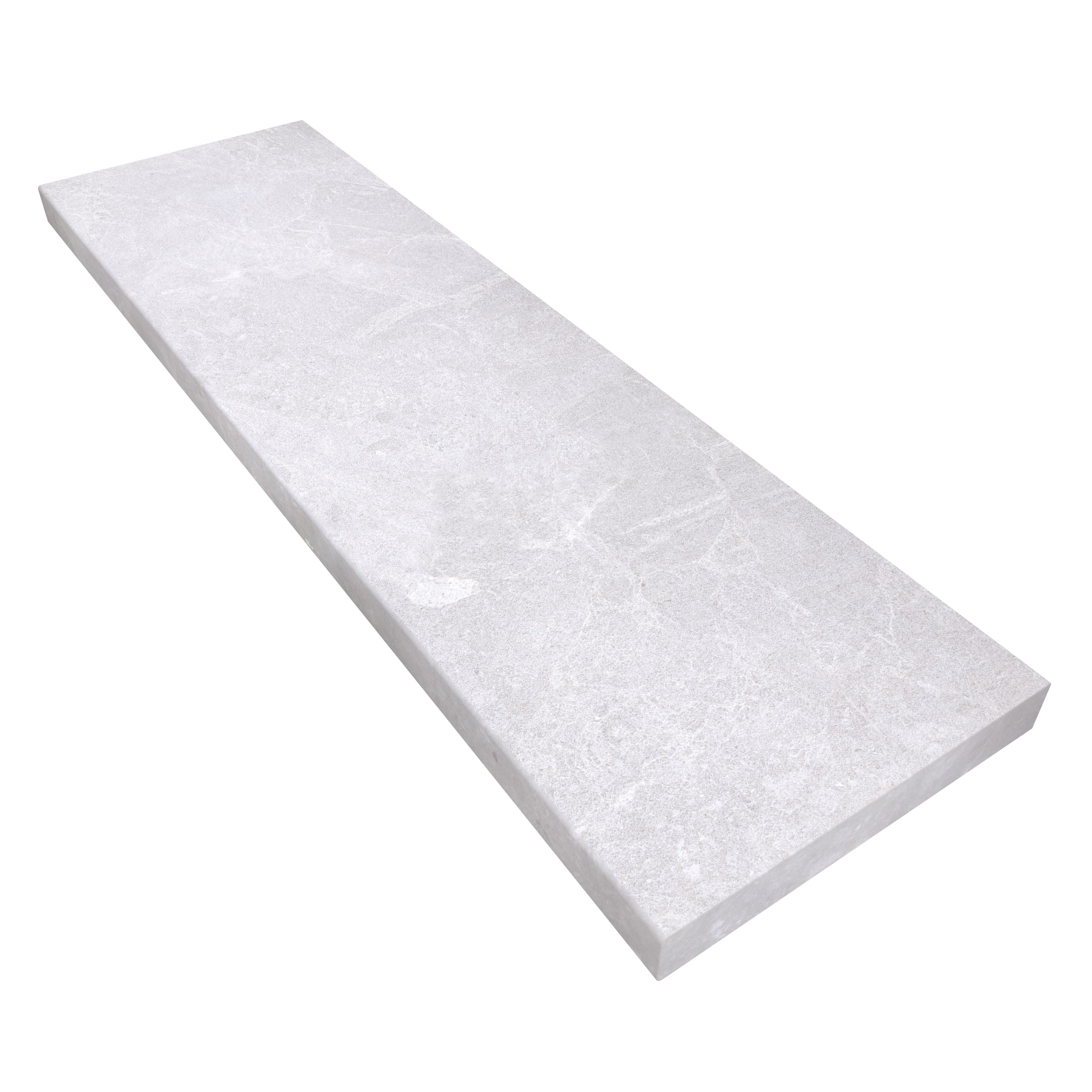Close-up of the Pera Cream Marble Sand Blasted 14x48x2 Eased Edge Coping, showcasing its light cream color with subtle veining and a textured sandblasted finish. Ideal for pool edges and steps, this marble piece adds elegance to any hardscape project.