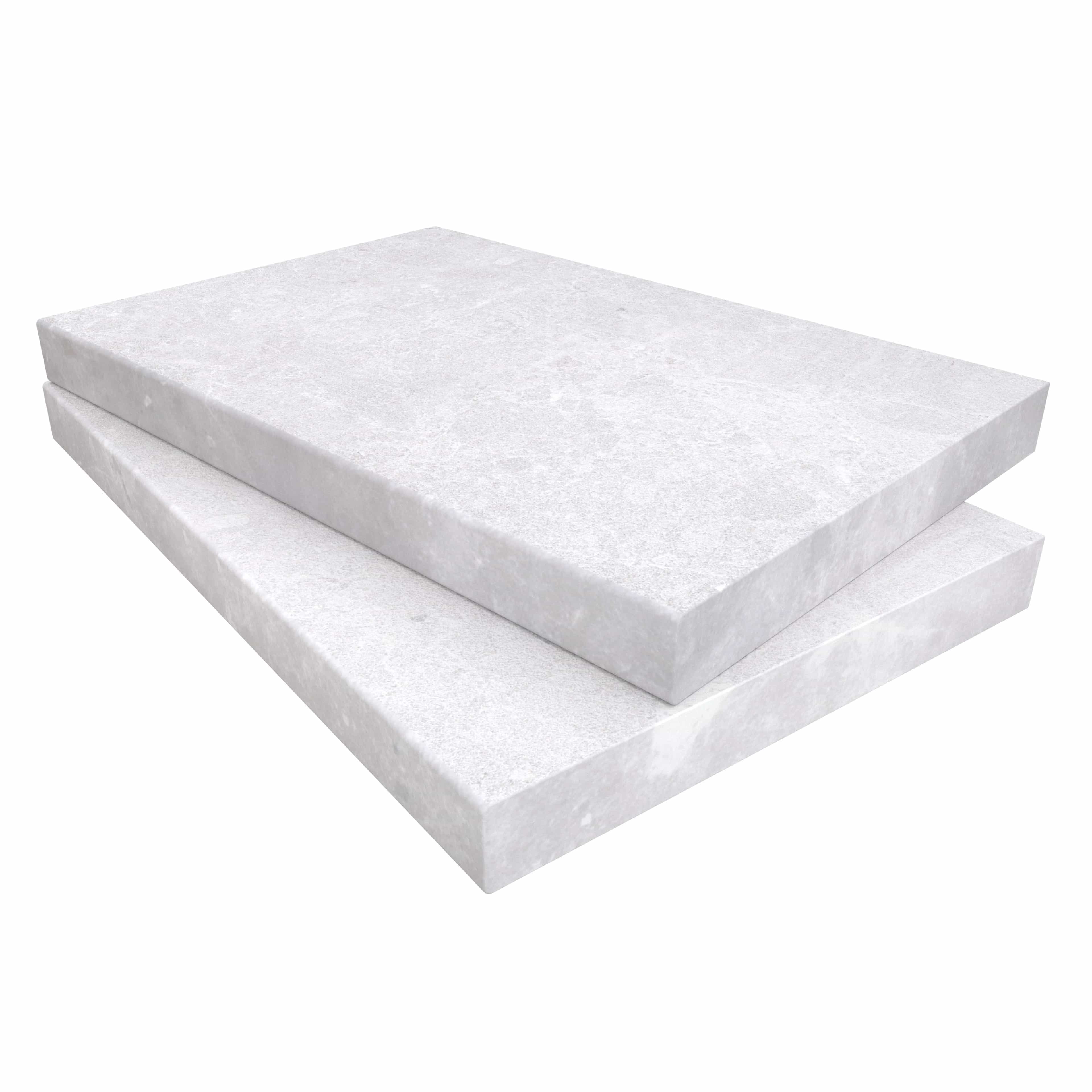 Close-up of the Pera Cream Marble Sand Blasted 16x24x2 Eased Edge Coping by STONELUX. The marble features a subtle cream hue with a sandblasted finish, showcasing a smooth texture and eased edges, ideal for pool edges or wall caps.