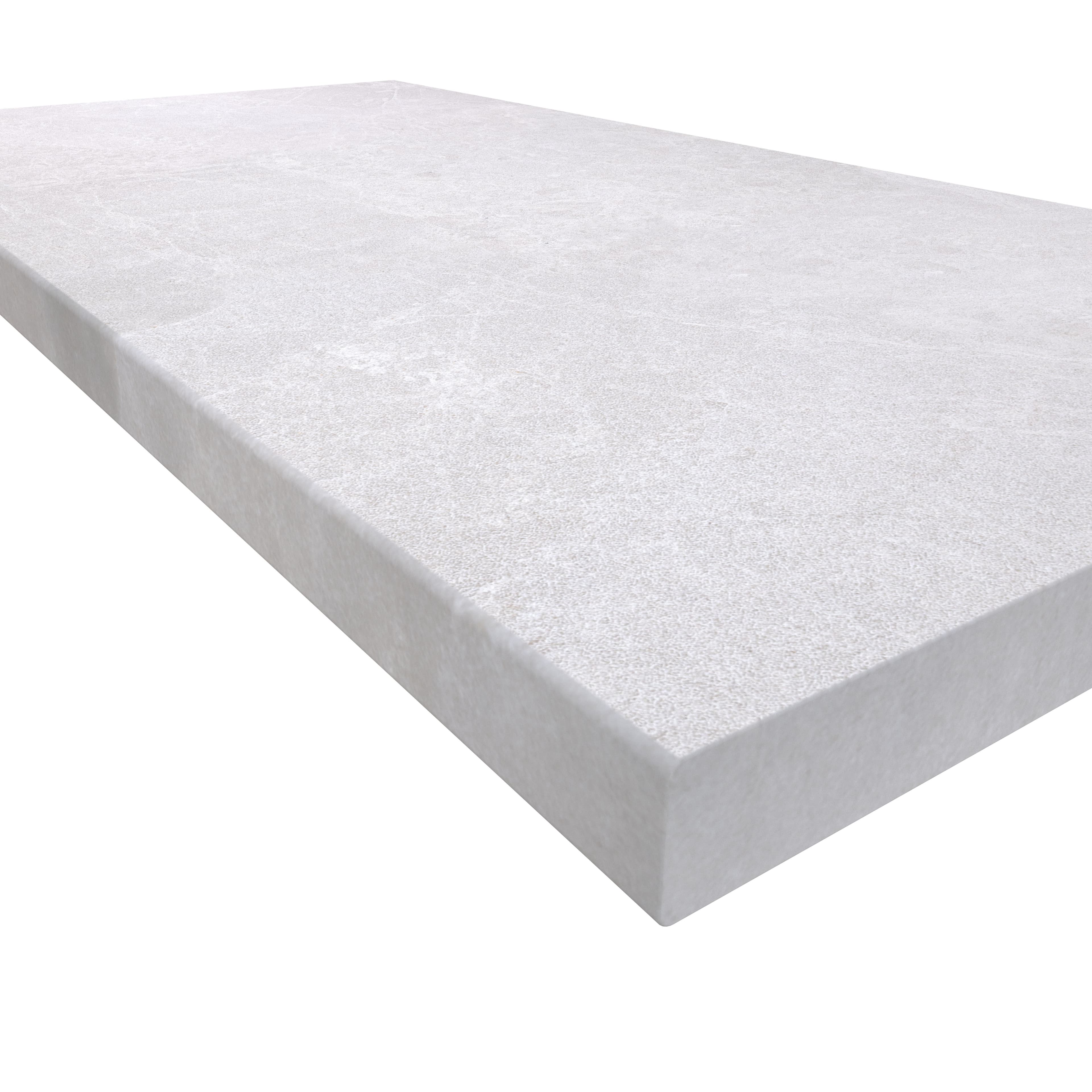 Close-up of Pera Cream Marble Sand Blasted 24x48x2 Eased Edge Coping. The marble features a subtle cream hue with a sandblasted finish, highlighting its fine texture and natural veining. Ideal for pool edges and step treads, showcasing its elegant design.