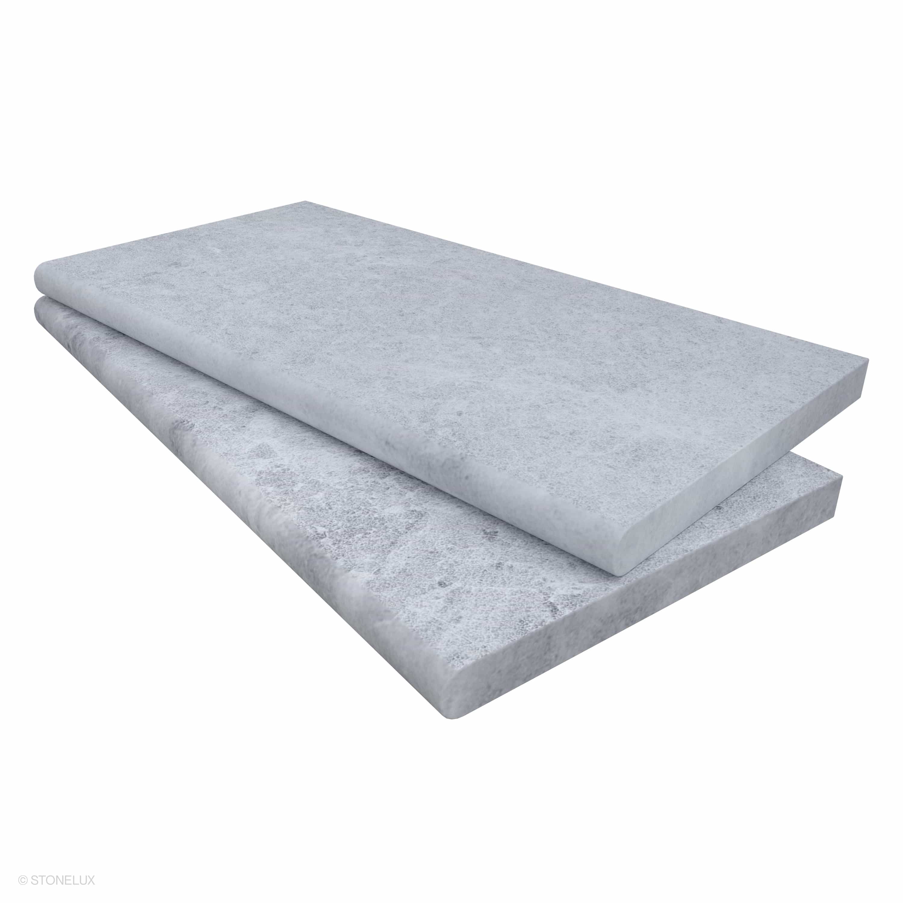 Close-up of the Tundra Grey Marble Sand Blasted 12x24x3cm Single Bullnose Coping, showcasing its smooth sandblasted finish and subtle grey tones. Ideal for pool edges and wall caps, this marble coping offers a refined, durable edge with a single bullno...