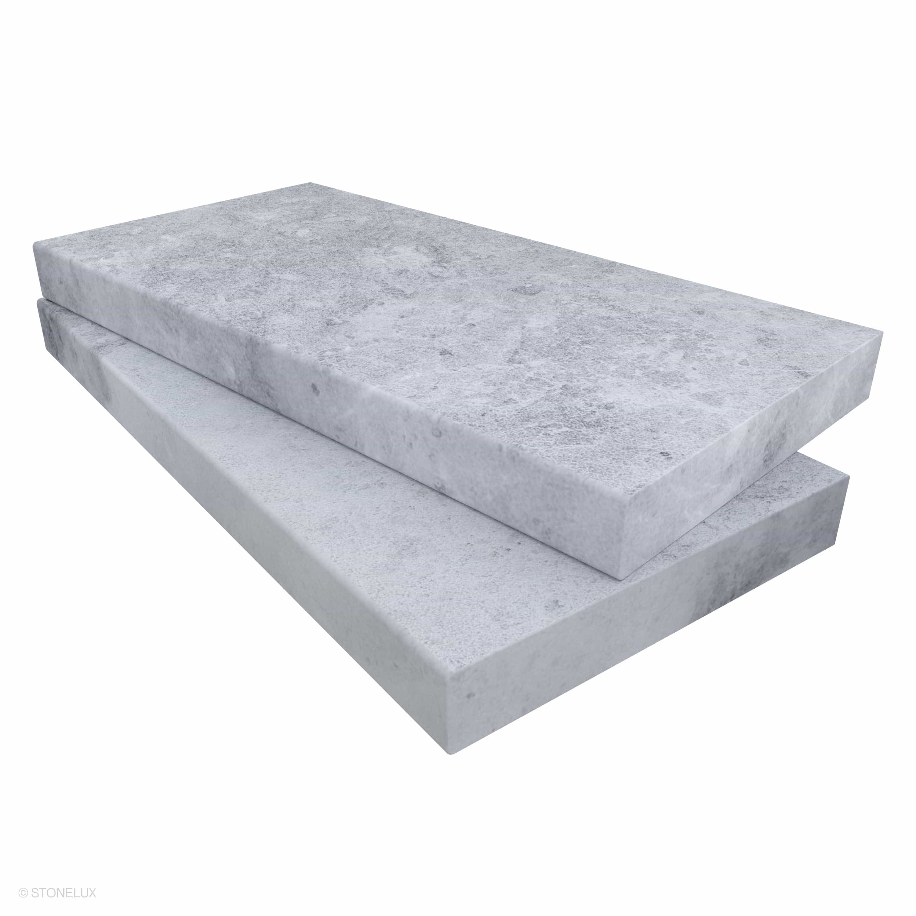 Tundra Grey Marble Sand Blasted 12x24x2 Eased Edge Coping by STONELUX displayed in close-up. Featuring a textured, sandblasted surface with subtle grey veining, this marble coping is ideal for pool edges or wall caps, offering a sleek, modern look.