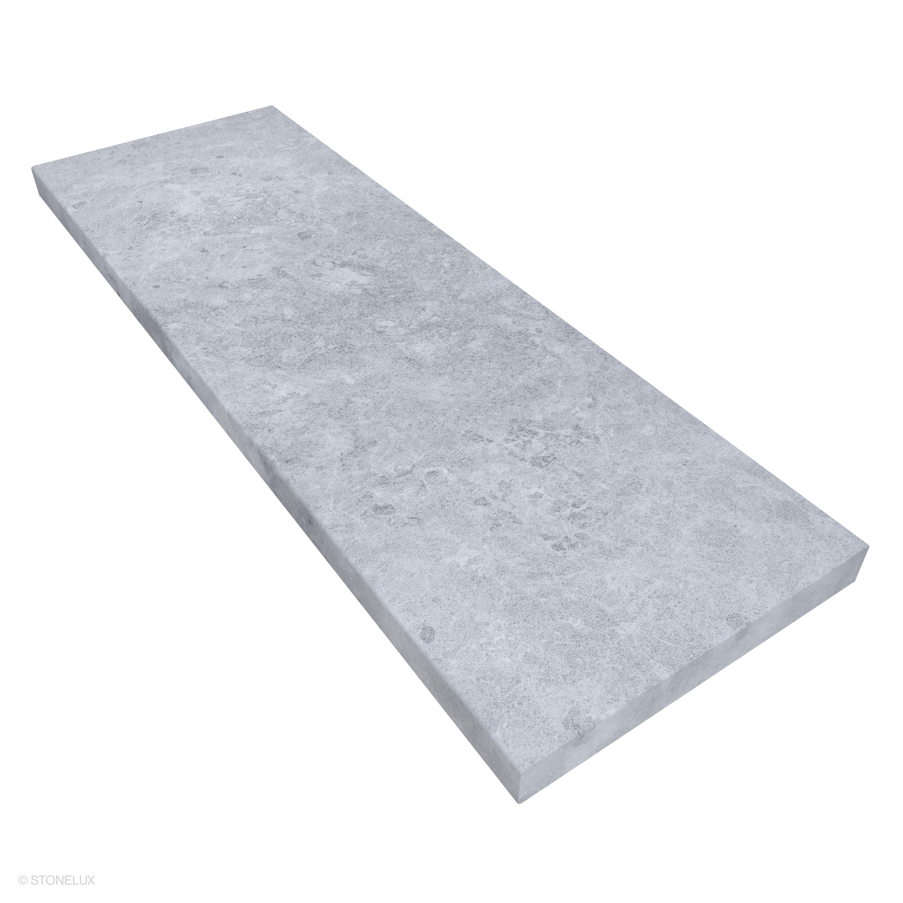 Tundra Grey Marble Sand Blasted 16x48x2 Eased Edge Coping by STONELUX, showcasing a sandblasted marble surface with subtle grey veining. Ideal for pool edges or wall caps, its 16x48 size and eased edge offer a sleek, modern finish.