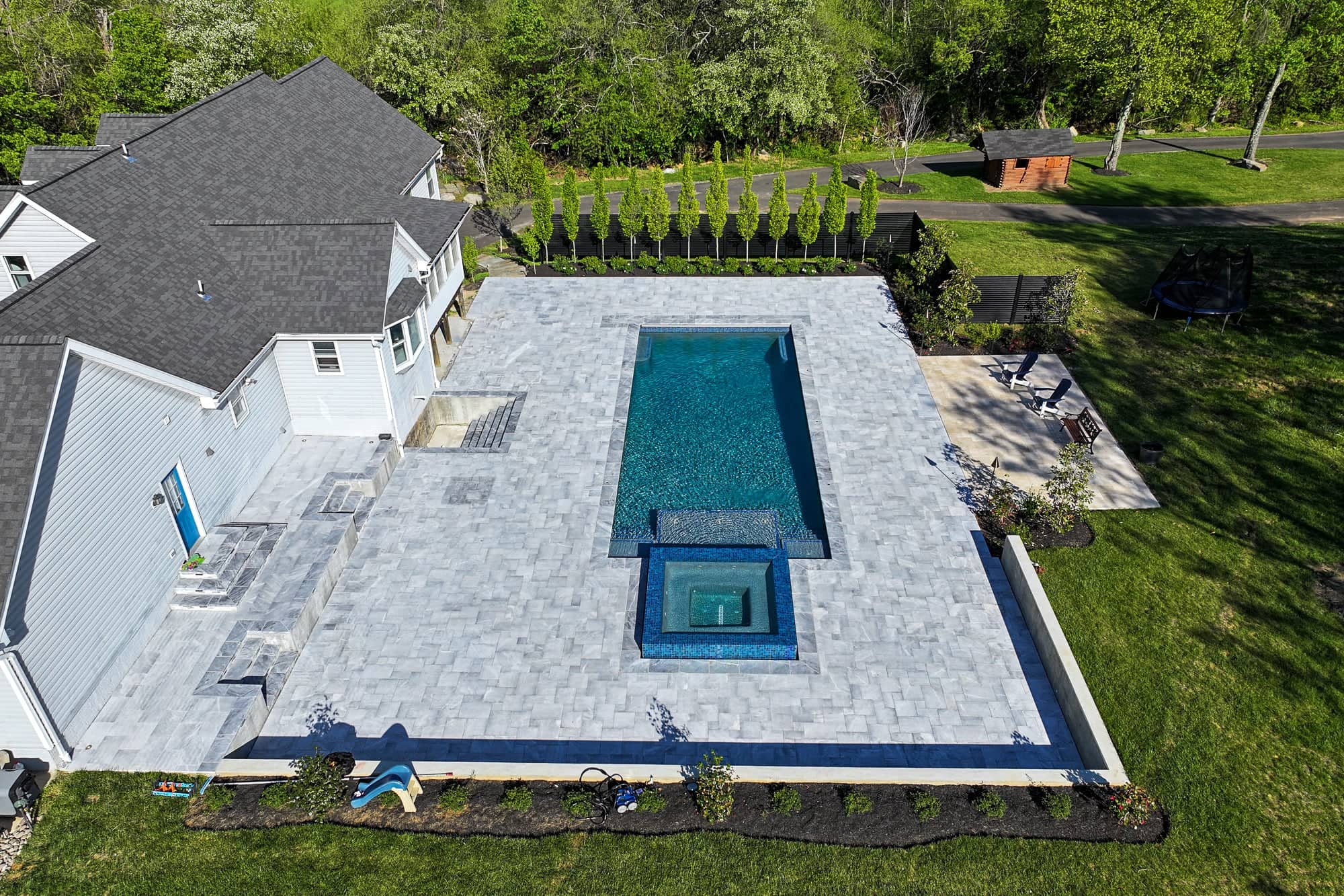 Arctic Retreat: Luxury Pool and Patio with Arctic Grey Marble Pavers