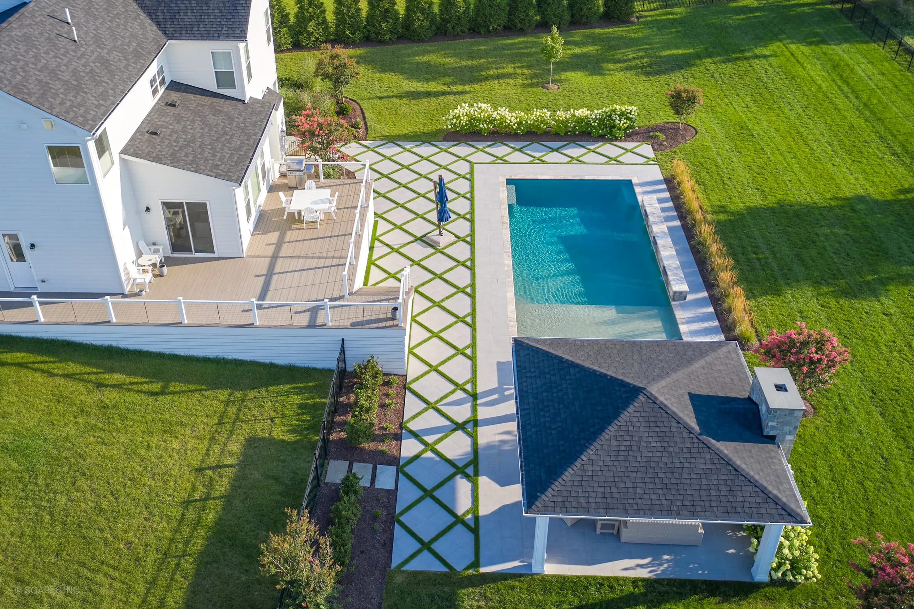 Golf Course Geometry: Porcelain Pavers with Turf - Project Photo