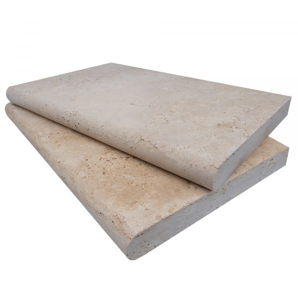 Two large Ivory Travertine Tumbled 16"x24"x2" Single Bullnose Copings stacked on top of each other, displayed against a plain white background. The surface of each coping shows natural texturing and color variation.