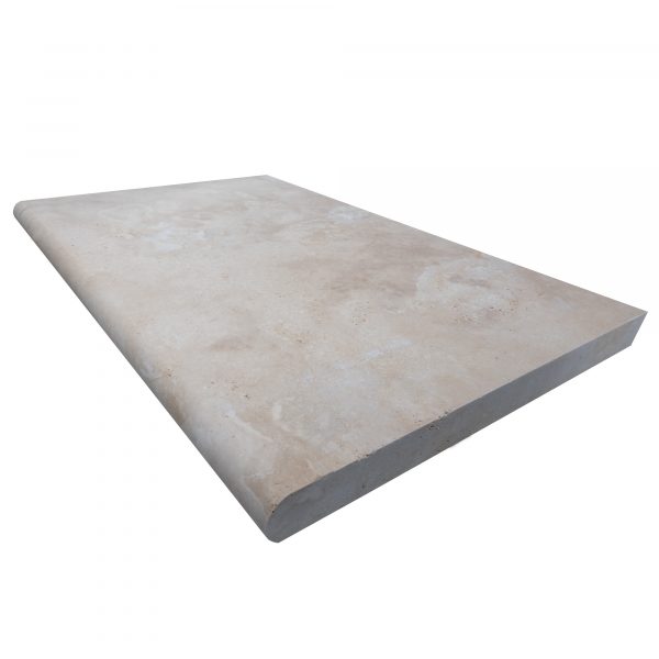 A rectangular Premium Ivory Travertine Tumbled 24"x36"x2" Single Bullnose Copings with a smooth, lightly stained surface, isolated on a white background.