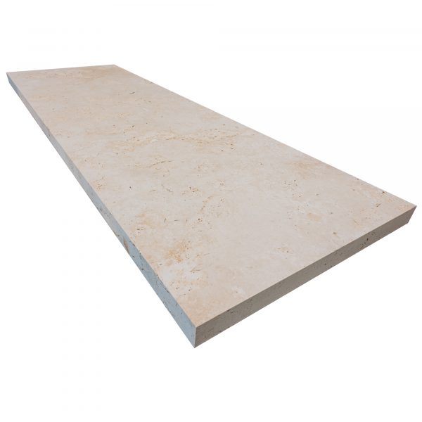 A rectangular Premium Ivory Travertine Tumbled 24"x72"x2" Eased Edge Tread visible natural patterns, viewed at an angle against a white background.