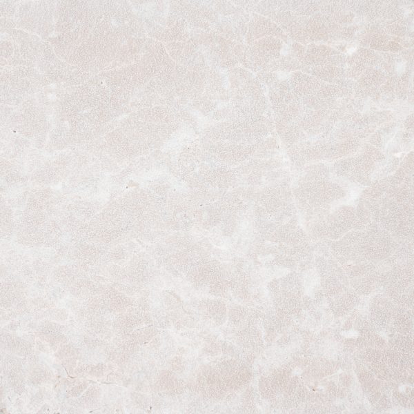 A high-resolution image of a textured, light beige Pera Cream Marble Sand Blasted 24x36 3cm Paver surface with subtle patterns and veins, demonstrating natural variations in color and detail.