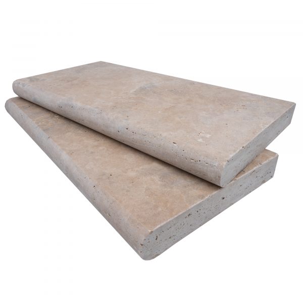 Two Premium Philly Travertine Tumbled 12"x24"x2" Single Bullnose Copings stacked on top of each other, set against a plain white background, highlighting details such as texture and edges.