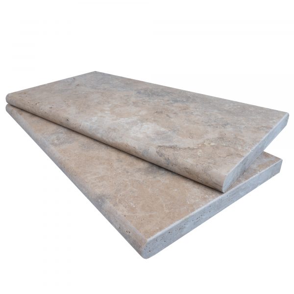 Two Premium Philly Travertine Tumbled 12"x24"x3CM Single Bullnose Copings stacked on each other, isolated on a white background. The texture on the copings appears smooth and lightly colored.