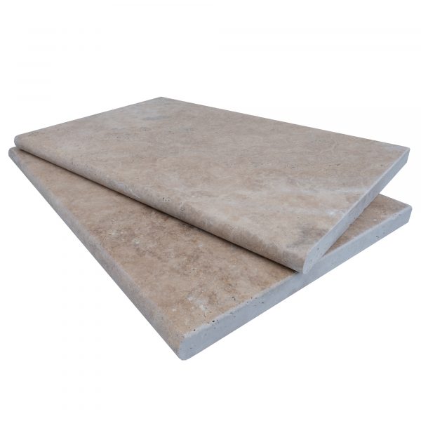 Two stacked Philly Travertine Tumbled 16"x24"x3CM Single Bullnose Copings with a smooth, beige textured surface on an isolated white background.