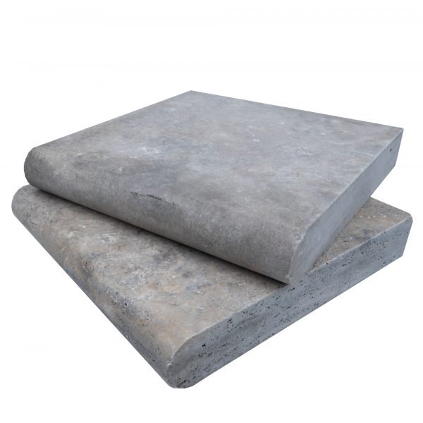 Two stacked Silver Travertine Tumbled 12"x12"x2" Single Bullnose Copings with rough textures and visible edges, displayed on a plain white background.
