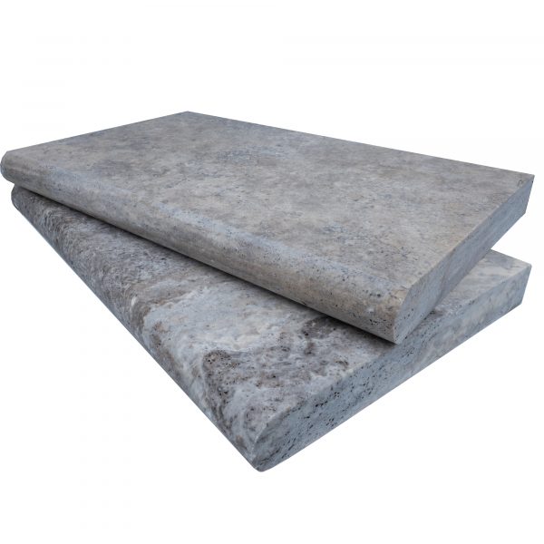 Two stacked Silver Travertine Tumbled 14"x24"x2" Single Bullnose Copings on a white background, displaying rough textures and natural gray tones.