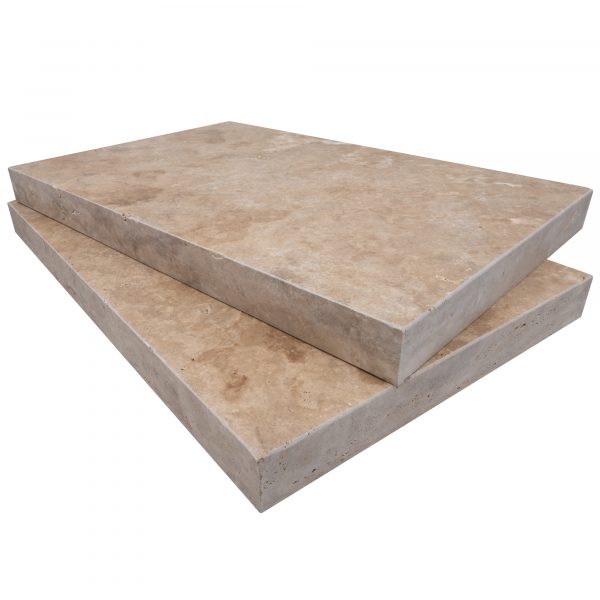 Two large, rectangular Walnut Travertine Tumbled 16"x24"x2" Eased Edge Coping stacked on top of each other, isolated on a white background.